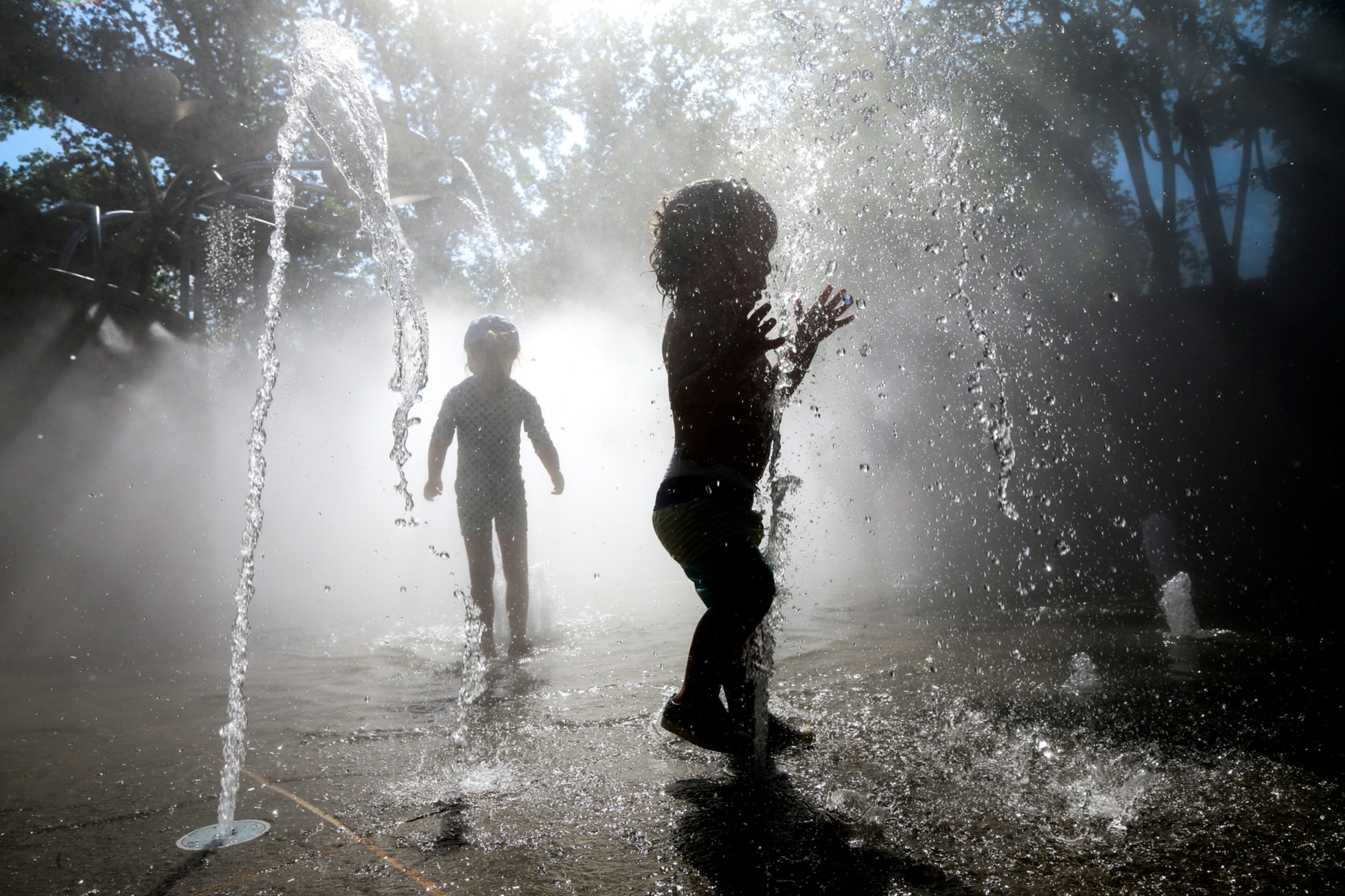 May 19, 2017 Atlanta: With temperature above normal this May, Nicolas Chapman, 1, (foreground-right) enjoyed cooling off at the Splash Pad at the Lou Glenn Children's Garden at the Atlanta Botanical Garden on Friday, May 19, 2017 with his Mom, Lauren (not pictured). The Chapman's are Garden members and biked to the Garden Friday. "We enjoy coming 2-3 times a week,"Â Mrs. Chapman said. Channel 2 meteorologist Karen Minton forecast Saturday to be mostly sunny with a high of 88. Rain is in the forecast for Sunday. JOHN SPINK/JSPINK@AJC.COM