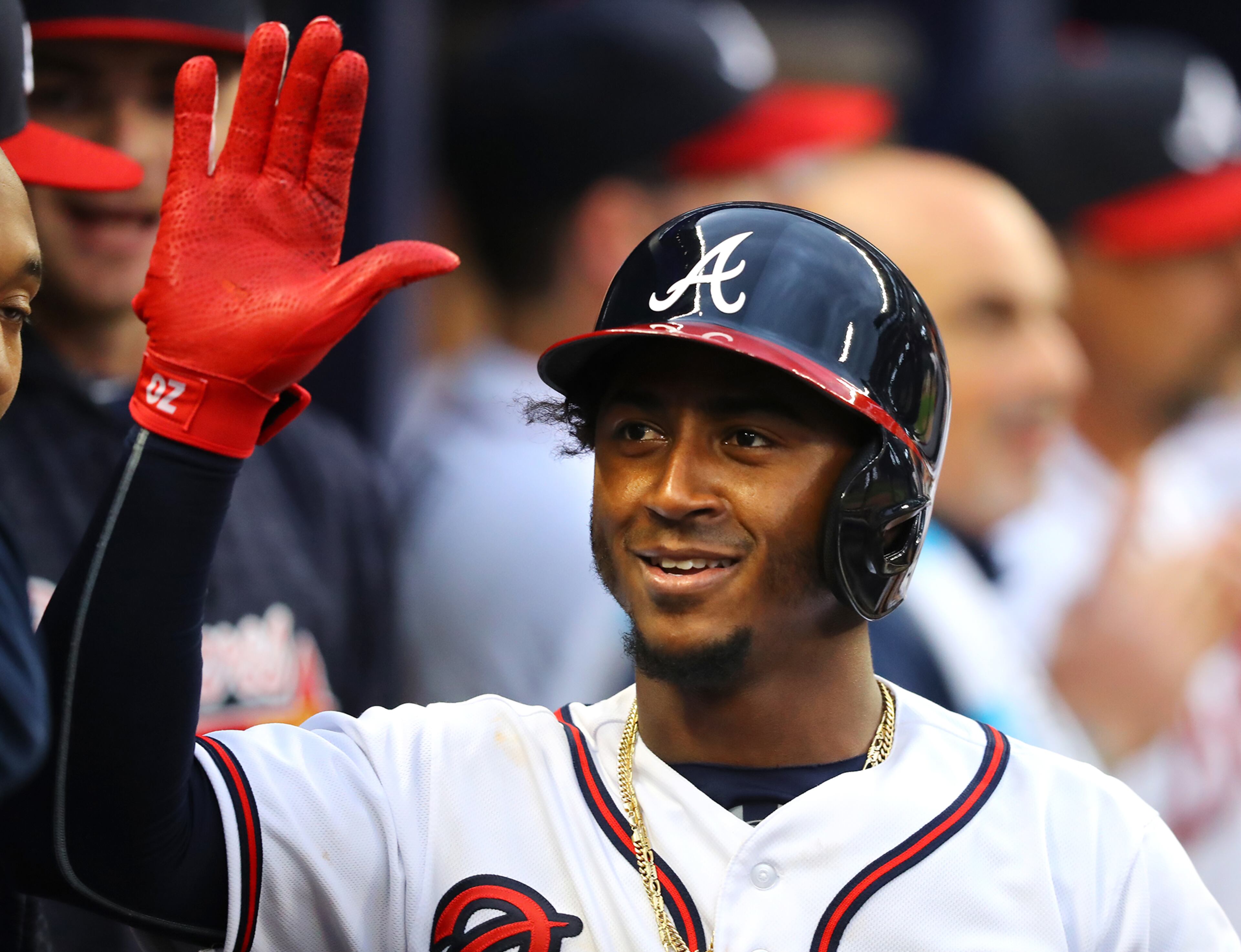 March 29, 2018 Atlanta: Braves second baseman Ozzie Albies celebrates hitting a solo homerun against the Phillies during the eight inning in a MLB baseball home opening game on Thursday, March 29, 2018, in Atlanta. Curtis Compton/ccompton@ajc.com