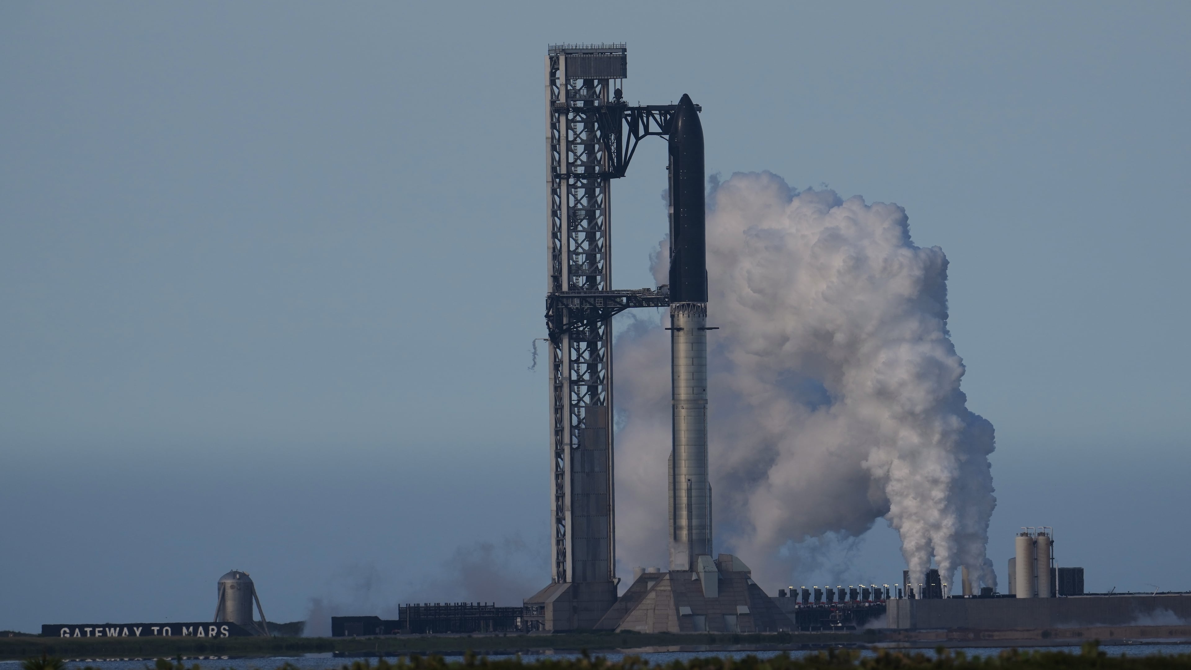 SpaceX's mega rocket Starship is prepared for a test flight that was later delayed, in Starbase, Texas, Thursday, May 21, 2026. (AP Photo/Eric Gay)