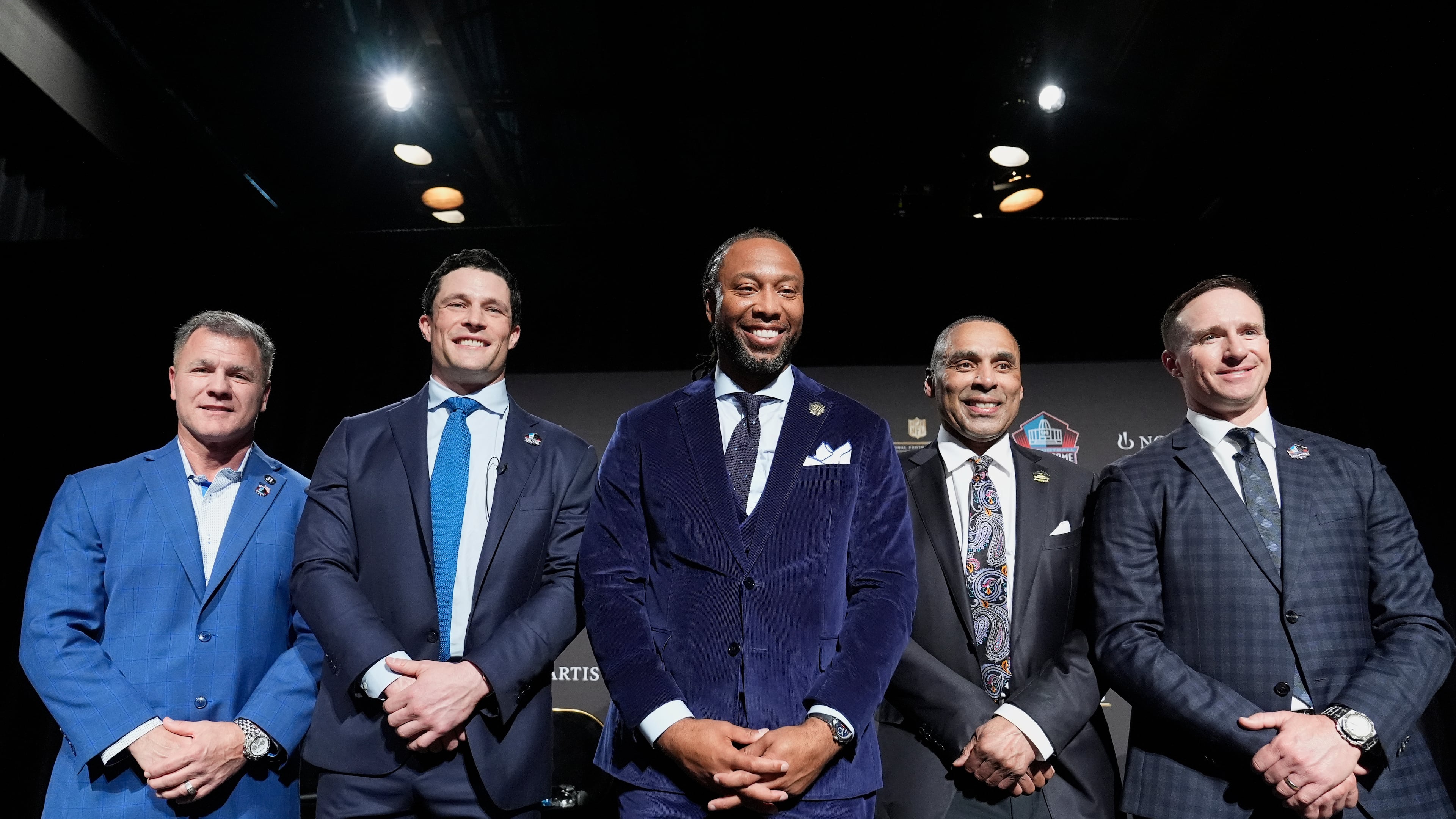 Adam Vinatieri, from left, stands with Luke Kuechly, Larry Fitzgerald, Roger Craig and Drew Brees after being announced for the Pro Football Hall of Fame class of 2026 during football's NFL Honors award show in San Francisco, Thursday, Feb. 5, 2026. (AP Photo/Brynn Anderson)