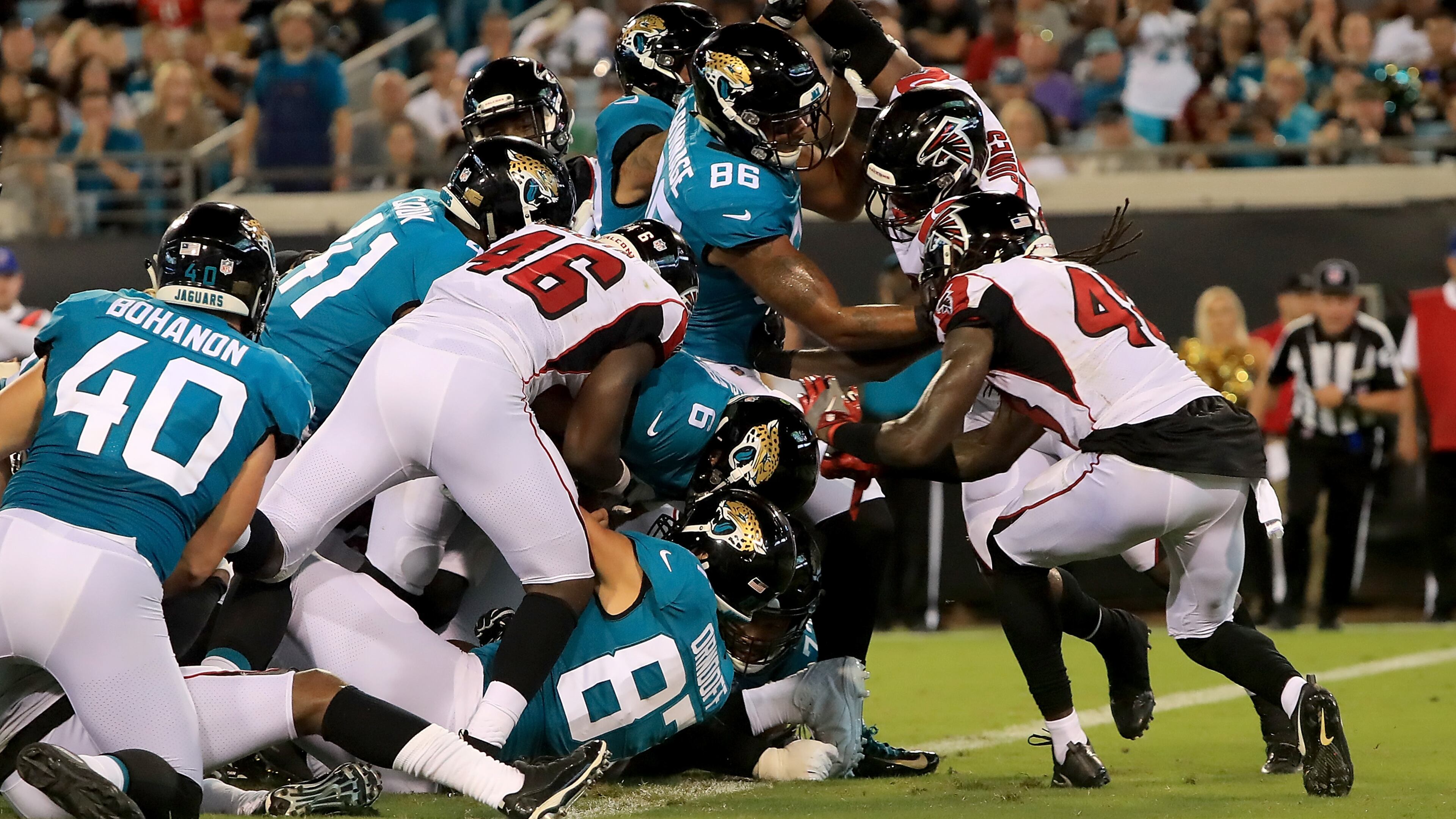 JACKSONVILLE, FL - AUGUST 25: Cody Kessler #6 of the Jacksonville Jaguars crosses the goal line for a touchdown during a preseason game against the Atlanta Falcons at TIAA Bank Field on August 25, 2018 in Jacksonville, Florida. (Photo by Sam Greenwood/Getty Images)