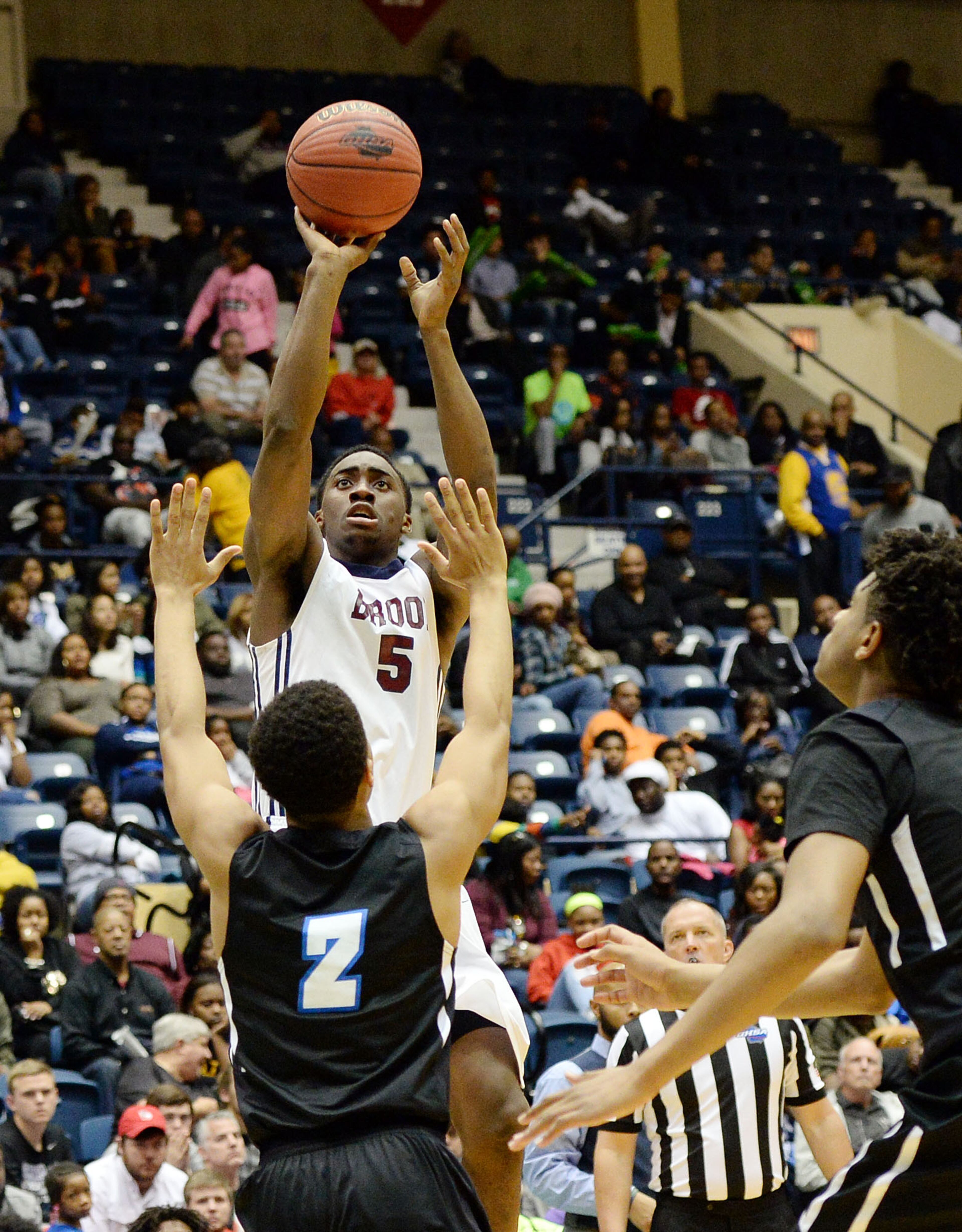 MARCH 5, 2016 MACON Pebblebrook Falcons Jatrious Smith (5) shoots as the Westlake Lions and the Pebblebrook Falcons play in the Class AAAAAA boys championship at the Macon Coliseum Saturday, March 5, 2016. The Westlake Lions beat the Pebblebrook Falcons, 68-58 for the championship. KENT D. JOHNSON/ kdjohnson@ajc.com