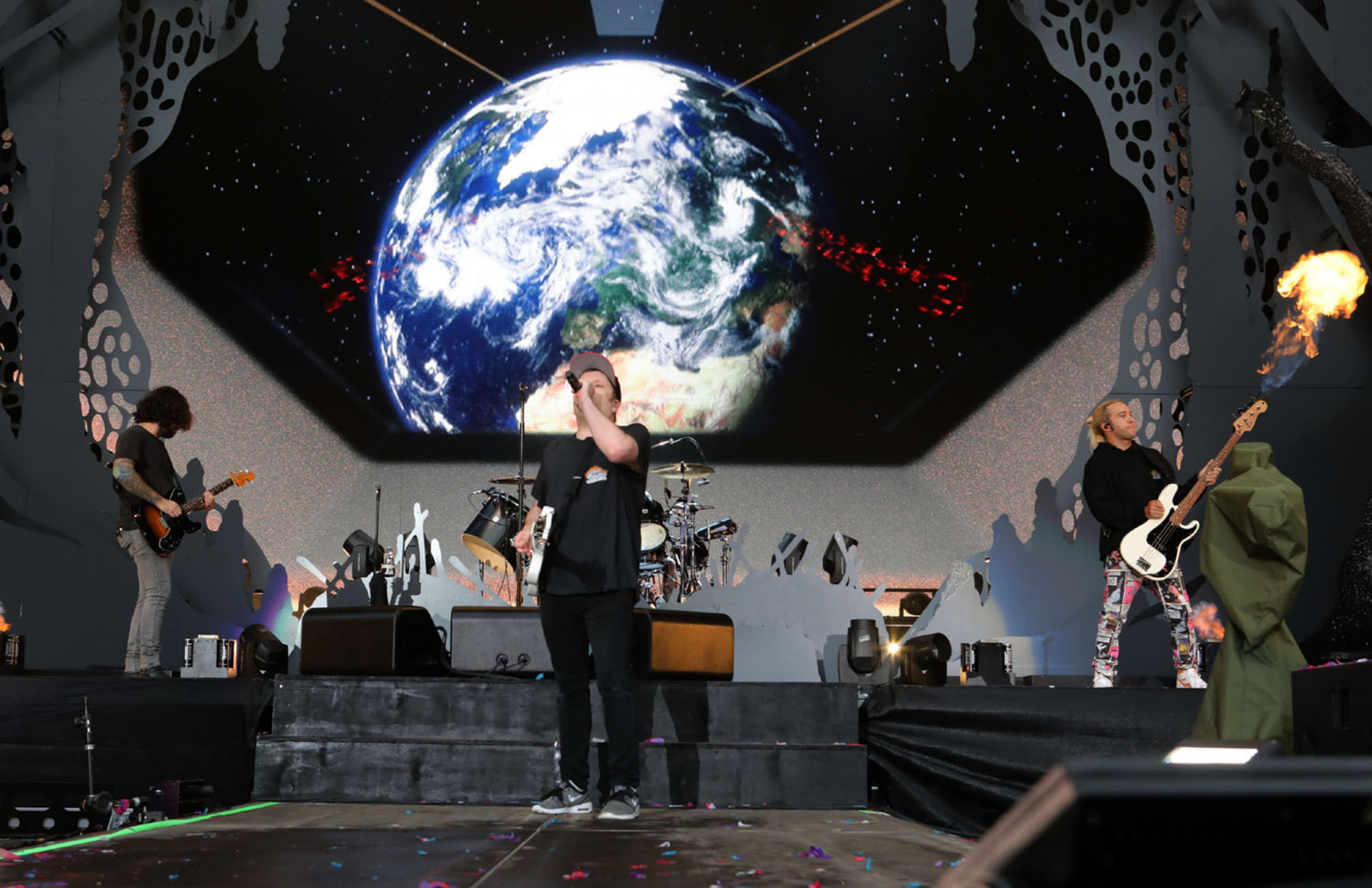 Chicago rockers Fall Out Boy perform "The Phoenix"
Green Day, Fall Out Boy and Weezer rocked out Truist Park on Tuesday, July 27, 2021 on the Hella Mega Tour.
An estimated 40,000 concert fans celebrated the return of live music and even early rains could not dampen the festive atmosphere at the Braves stadium.
Robb Cohen for the Atlanta Journal-Constitution