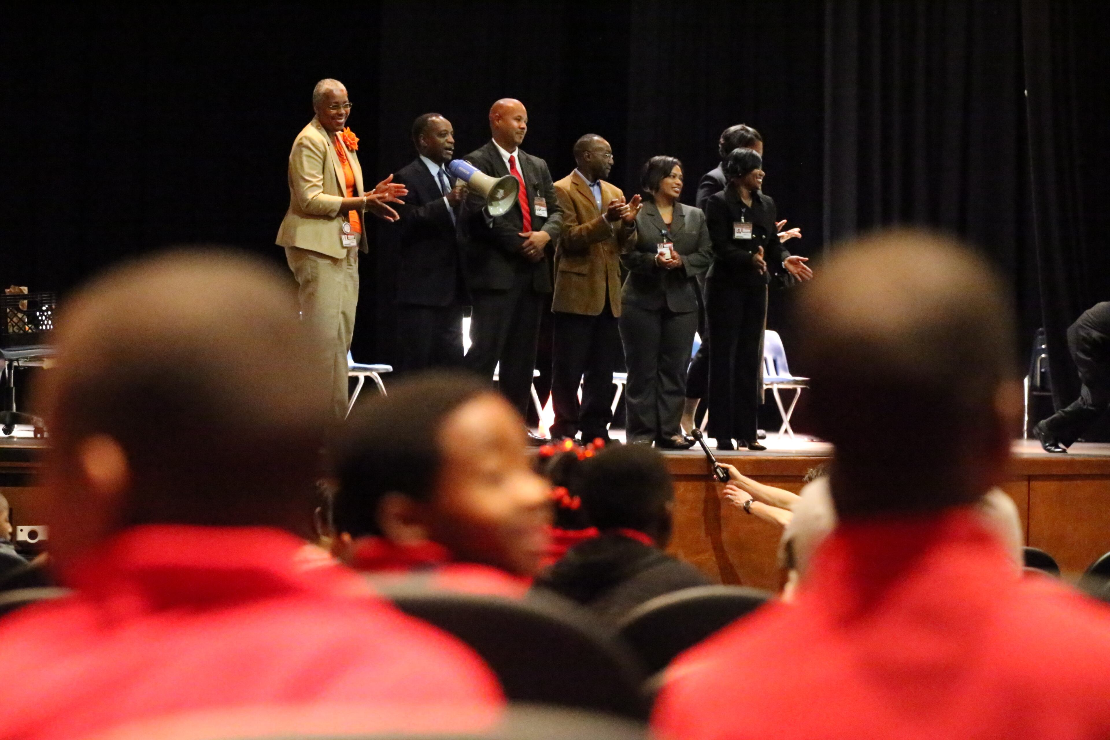 McNair Learning Academy students head back to school at McNair High School one day after an armed suspect created an hours-long ordeal.