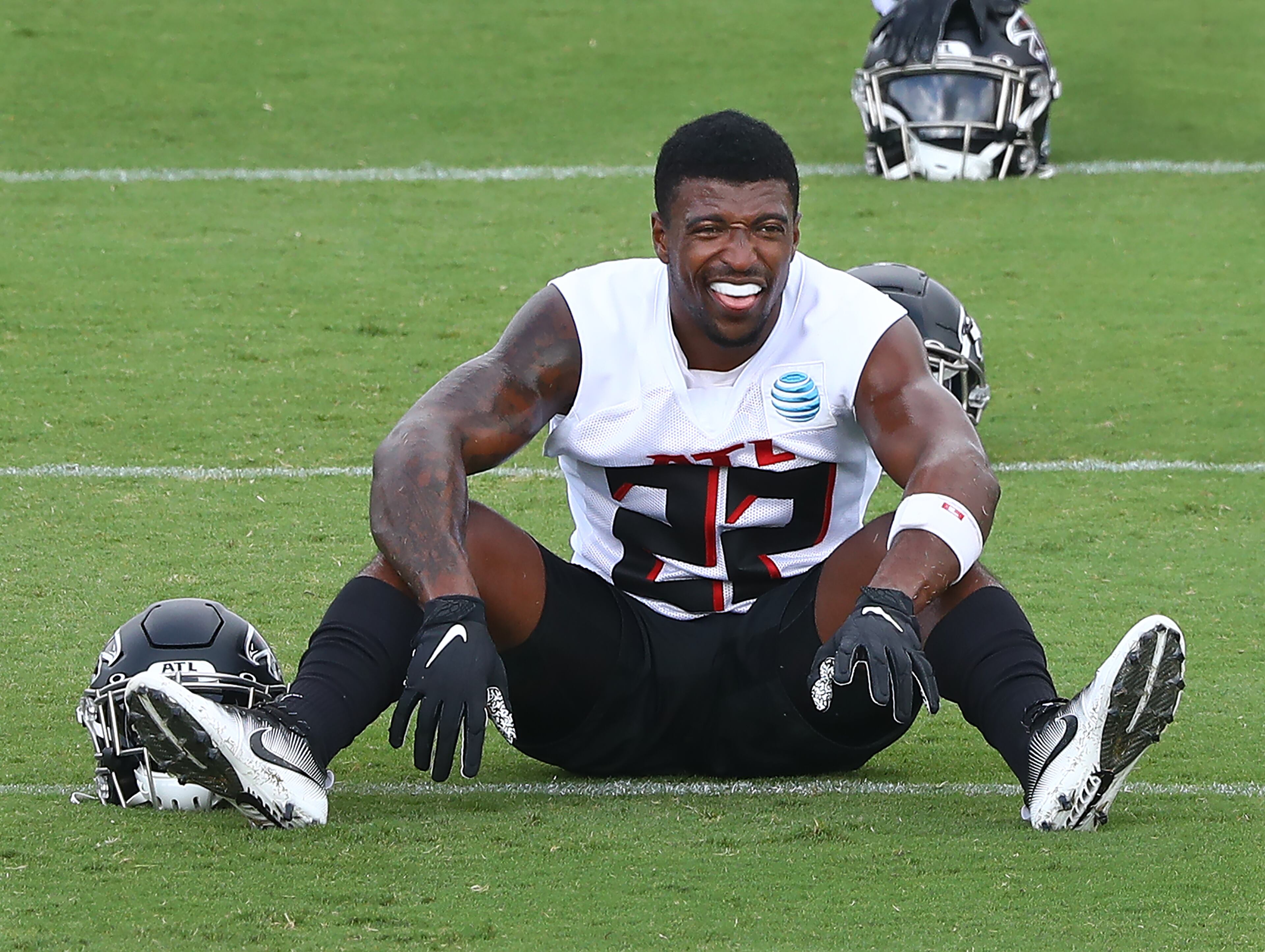 Falcons safety Keanu Neal loosens up with the team during training camp on Saturday, August 15, 2020 in Flowery Branch. Curtis Compton ccompton@ajc.com