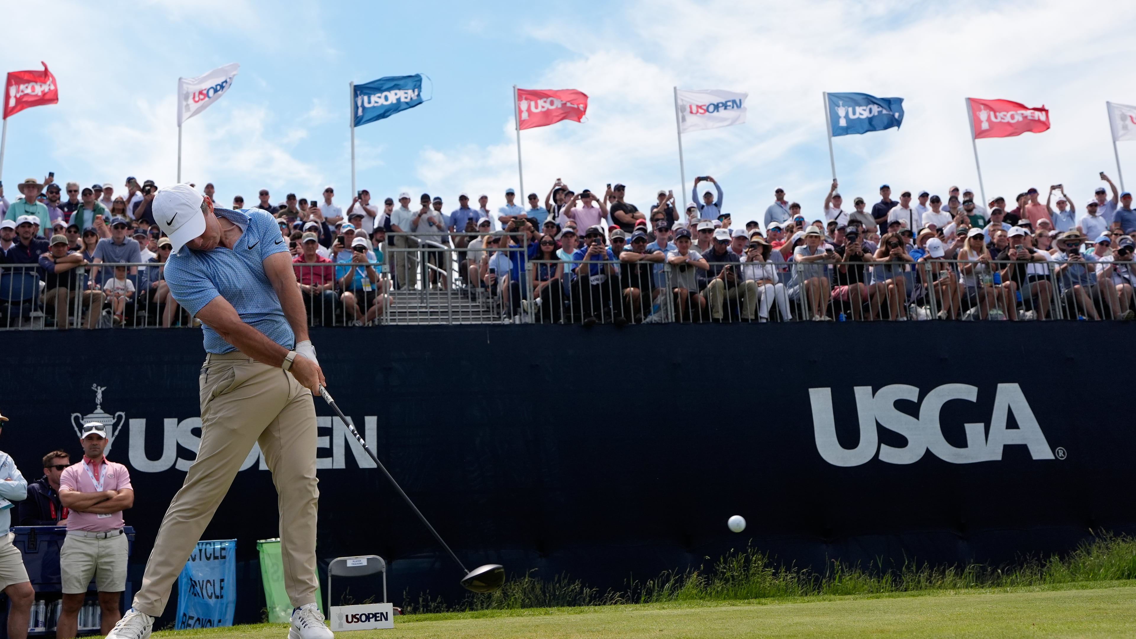 Rory McIlroy, of Northern Ireland, hits his tee shot on the 12th hole during a practice round for the U.S. Open golf tournament at Shinnecock Hills Golf Club in Southampton, N.Y., Wednesday, June 17, 2026.(AP Photo/David J. Phillip)