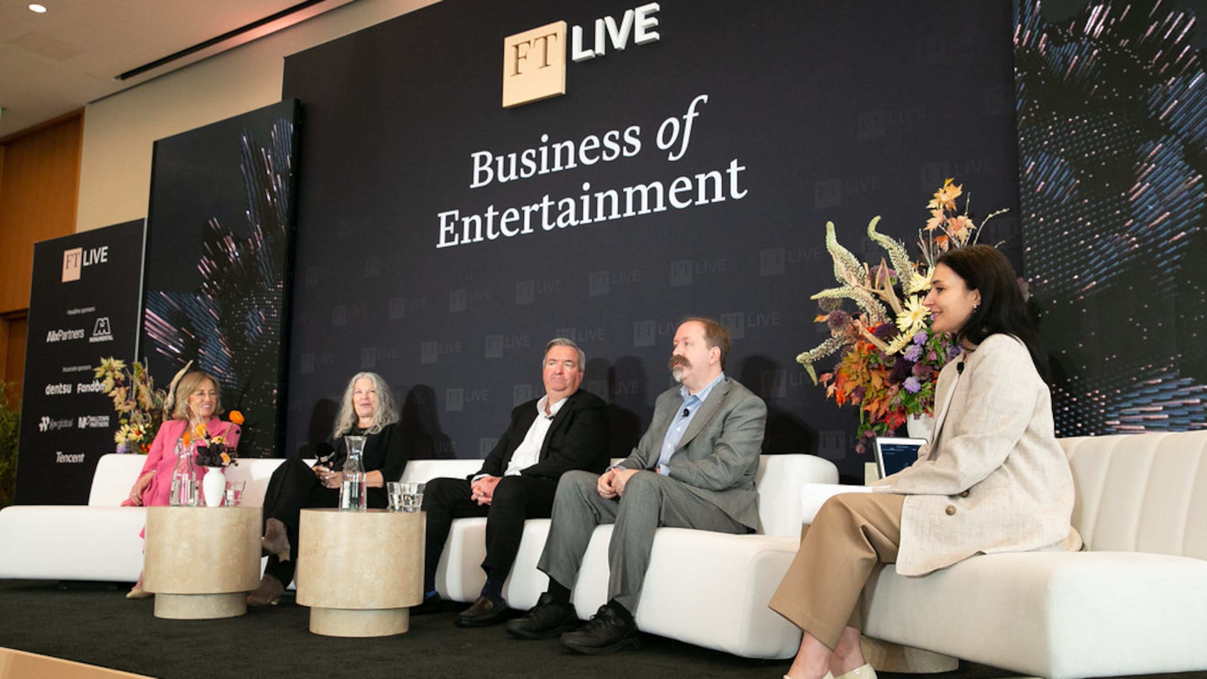 Industry leaders Dee Dee Myers (far left), Rebecca Rhine, the Western Executive Director of the Directors Guild of America, Paul Poteet, a partner with FGS Global and Kevin Klowden, the executive director of the Milken Institute, speak on a panel part of the Financial Times' Business of Entertainment Summit. (Courtesy of Hal Horowitz Photography)