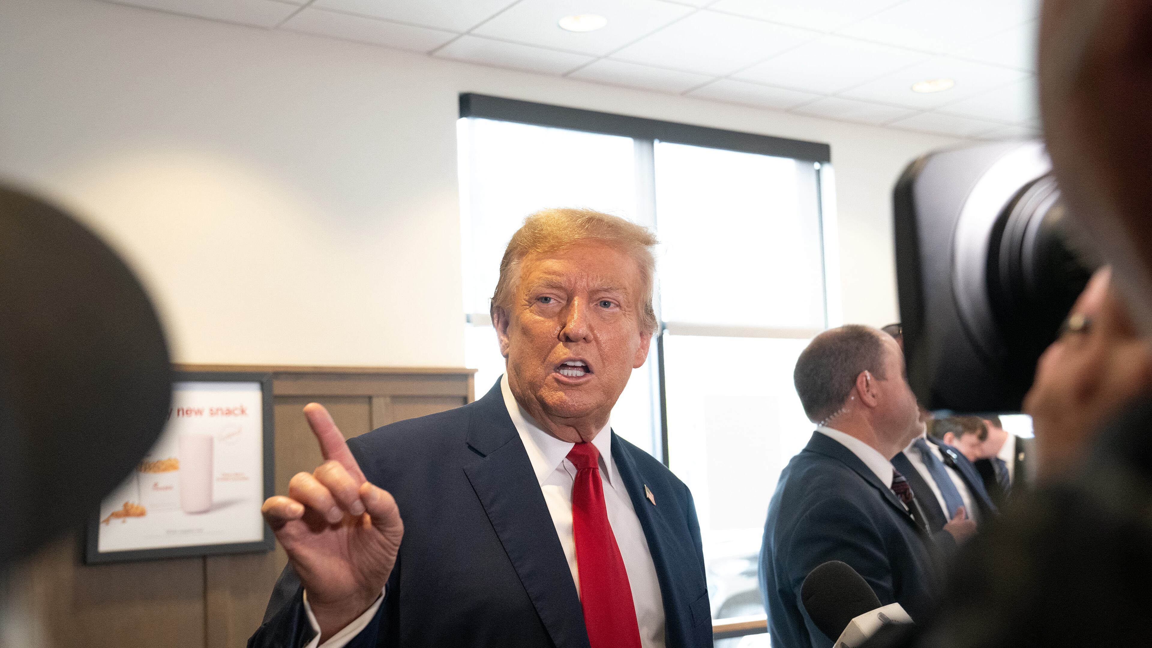 Former president Donald Trump speaks to the media on April 10 at a Chick-fil-A restaurant in Atlanta. (Megan Varner/Getty Images/TNS)
