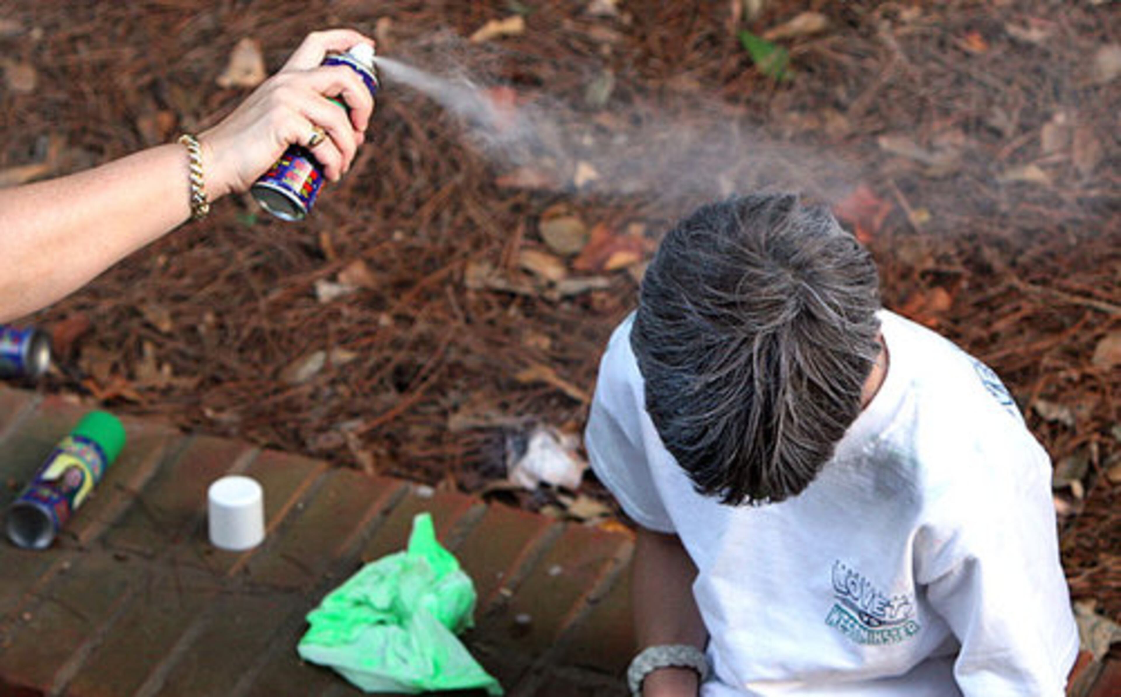 A young Westminster fan gets his hair painted in preparation for the Wildcats' game with the Lovett Lions.