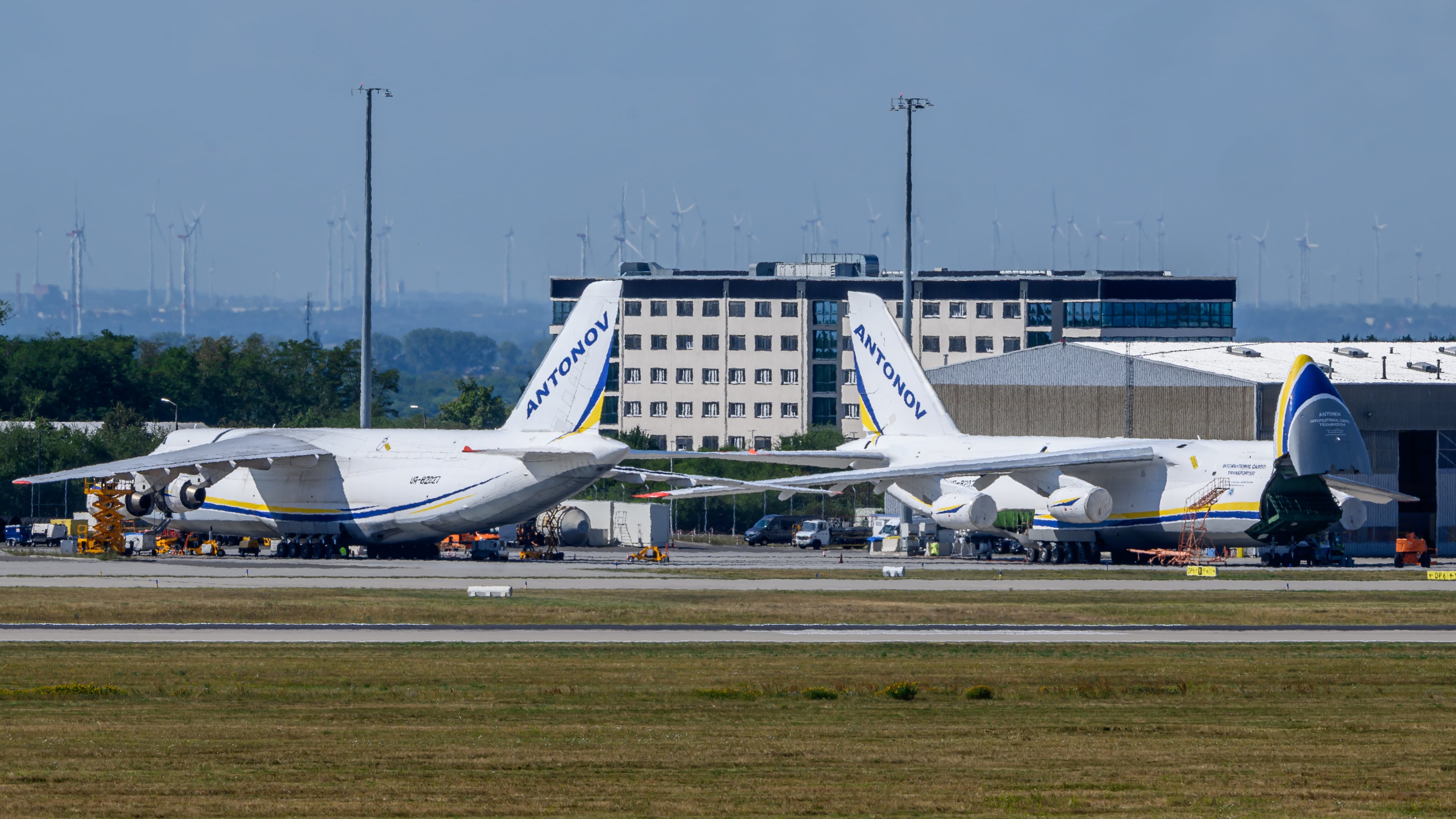 Ukrainian Antonov aircrafts are parked behind a fence on the grounds of Leipzig/Halle Airport, where investigations are underway following the drone incident that occurred early Wednesday morning, in Schkeuditz, Germany, Thursday Aug. 6, 2026. (Hendrik Schmidt/dpa via AP)