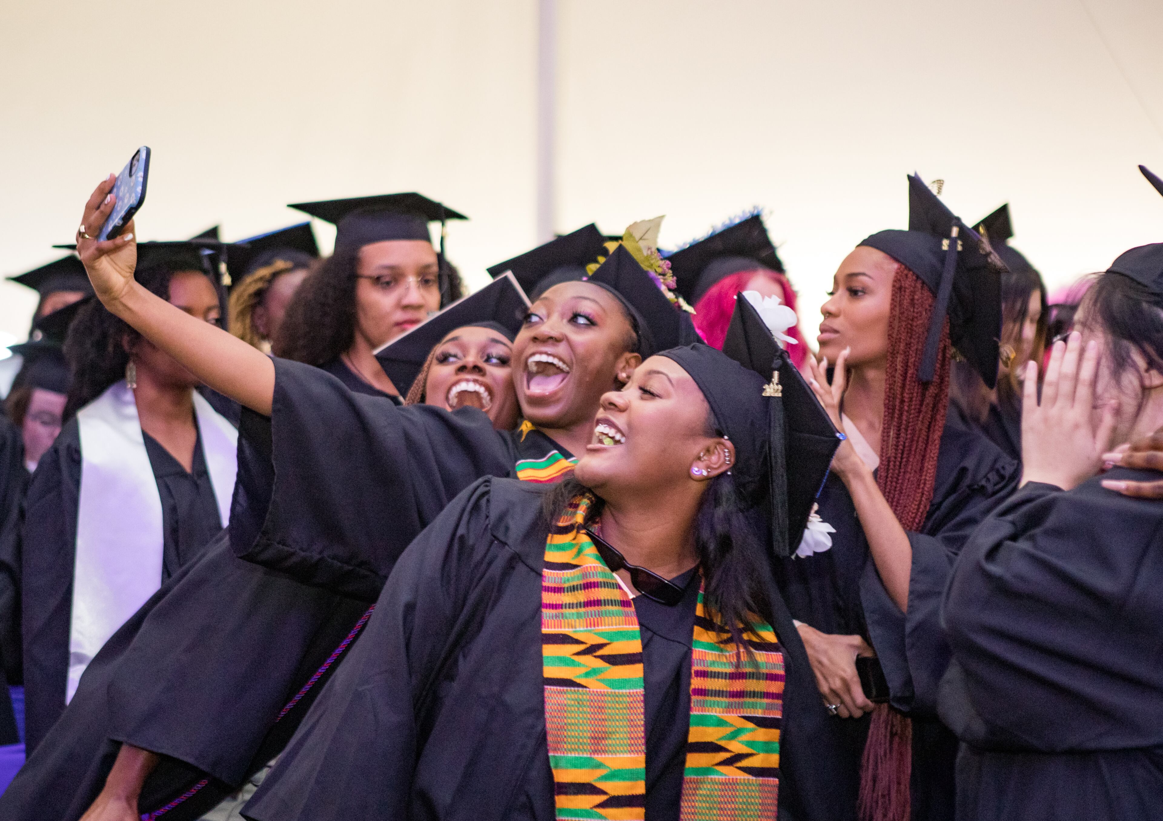 Agnes Scott College graduates celebrate during their graduation ceremony on Saturday, May 14, 2022. Actress and singer Saycon Sengbloh delivered the commencement address to the college’s largest graduating class with 282 graduates. (Jenni Girtman for The Atlanta Journal-Constitution)