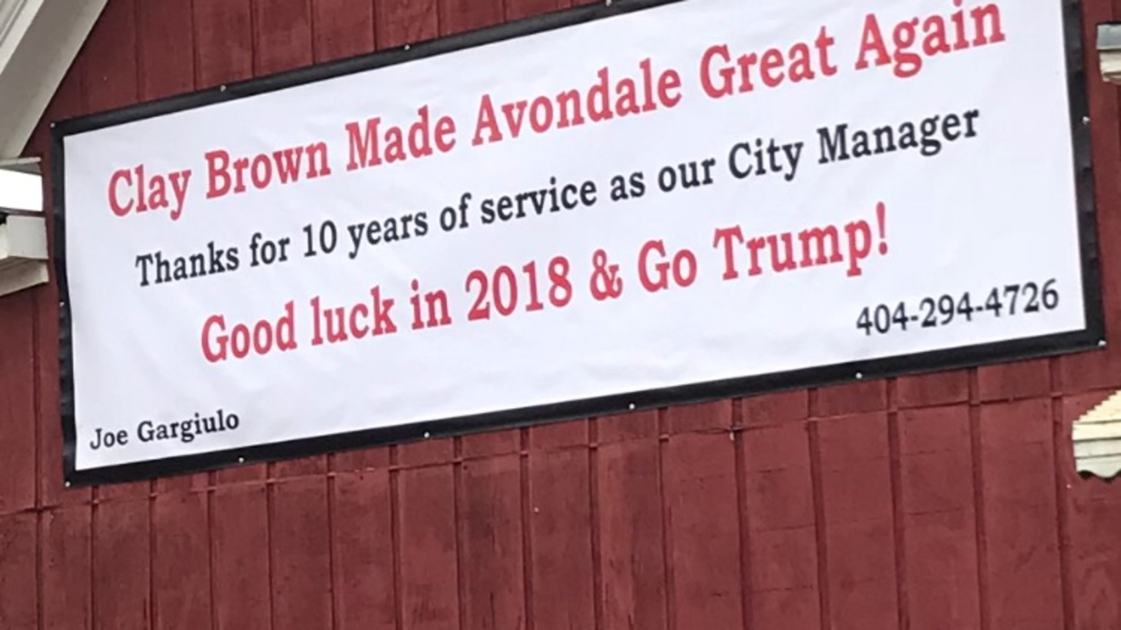This abandoned building in Avondale Estates is on the site that developer Trammell Crow Residential wants to purchase for a mixed use project. The sign was erected by property owner Joe Gargiulo shortly before Christmas, but has since been removed after Brown (first name actually spelled “Clai”) rescinded his resignation. Bill Banks for the AJC