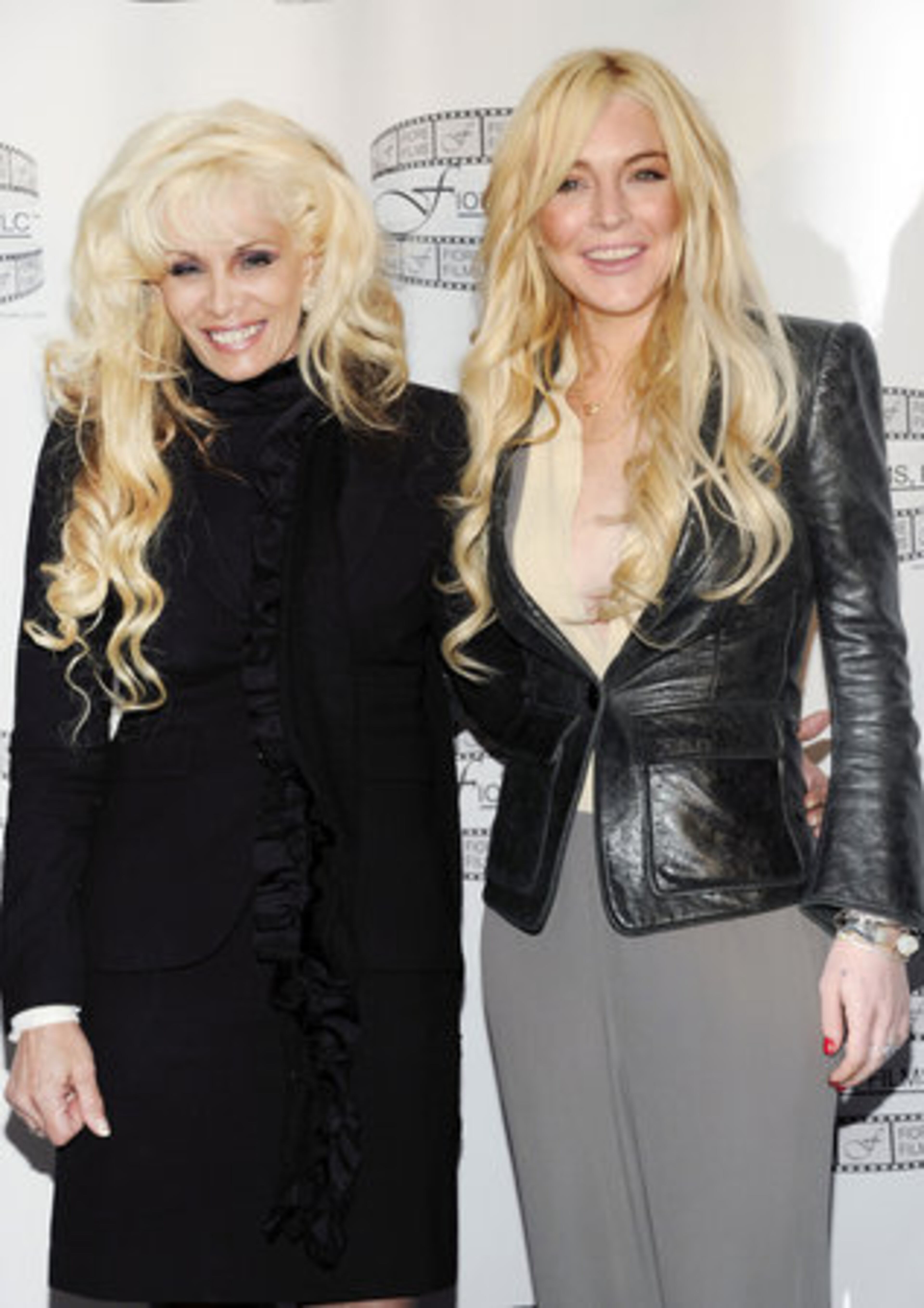 GOT GOTTI? Victoria Gotti, daughter of John Gotti Sr., left, and actress Lindsay Lohan pose during a news conference for the film "Gotti: Three Generations", based on the life of John Gotti, leader of the Gambino crime family, at The Sheraton Hotel on Tuesday, April 12, 2011 in New York. Lohan is currently in talks to star in the film, along with John Travolta, who is confirmed to portray John Gotti in the biopic.