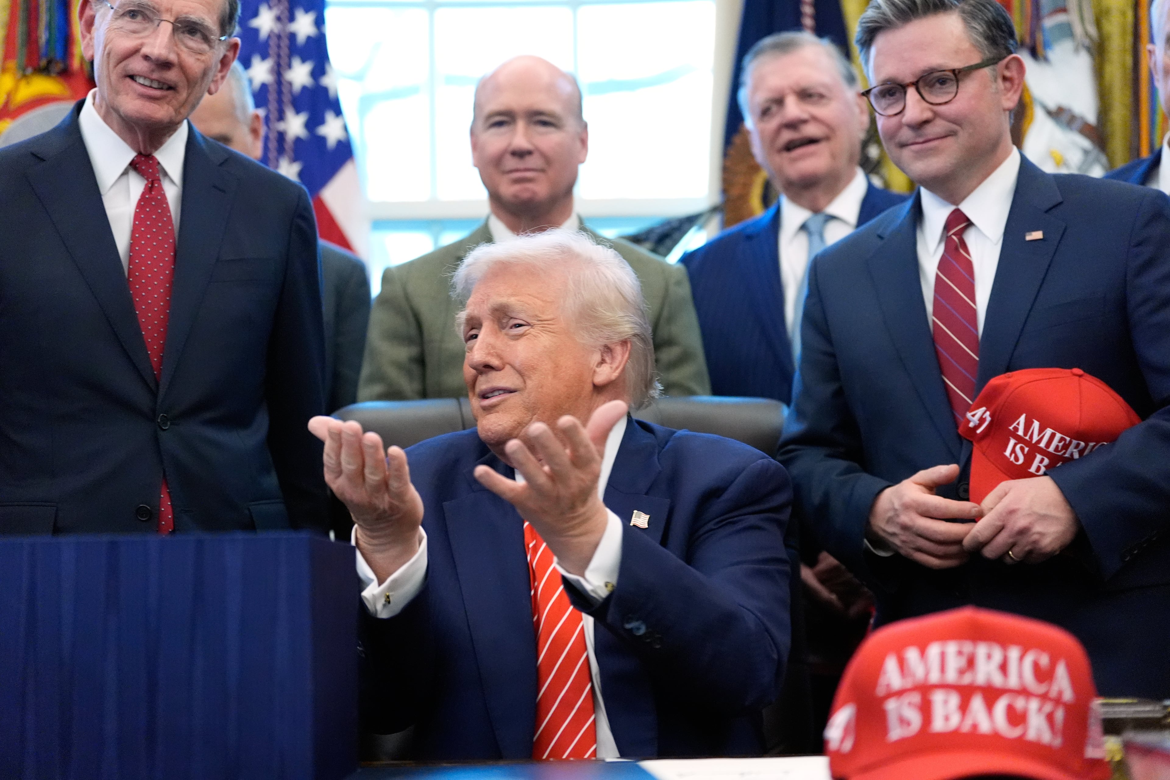 President Donald Trump spoke to reporters in the White House on Tuesday after signing a spending bill that ends a partial shutdown of the federal government. (Alex Brandon/AP)