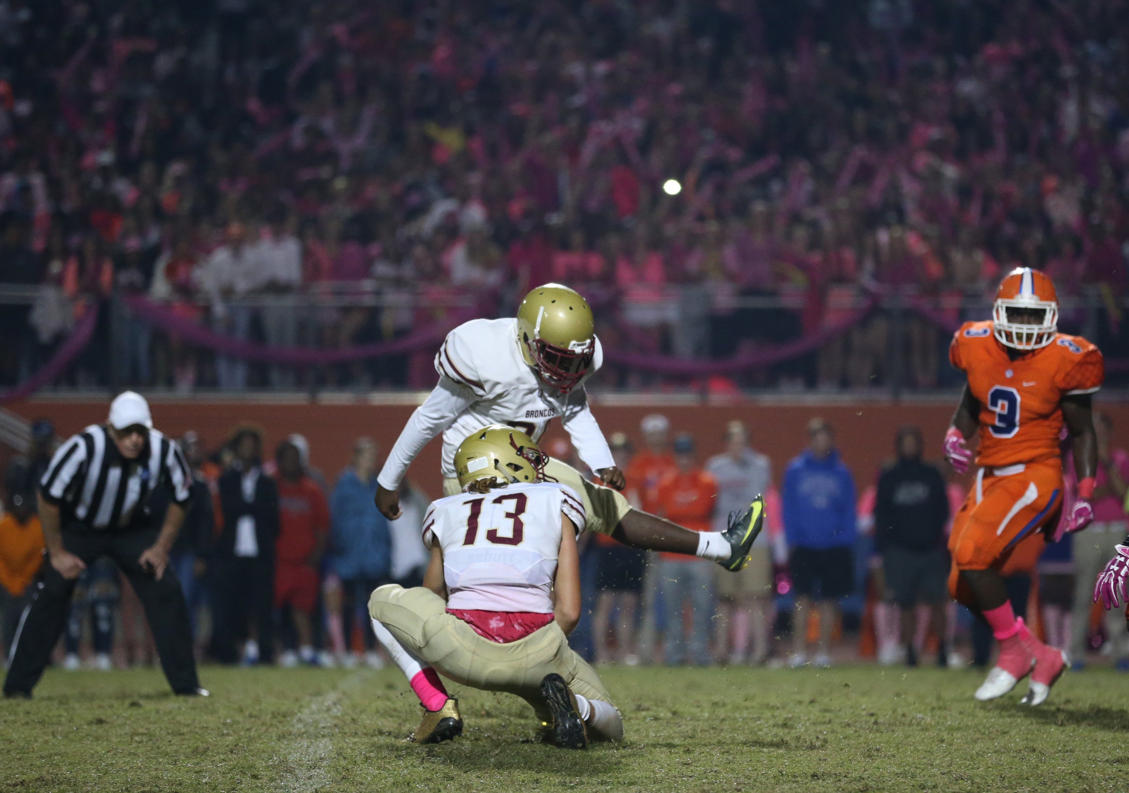 October 20, 2017 - Lilburn, Ga: Brookwood kicker Jonah Randle (94) kicks the game-winning field goal as Cameron Barrington (13) holds in the second half of their game against Parkview at Parkview High School Friday, October 20, 2017, in Lilburn, Ga.. Brookwood won 30-27. PHOTO / JASON GETZ