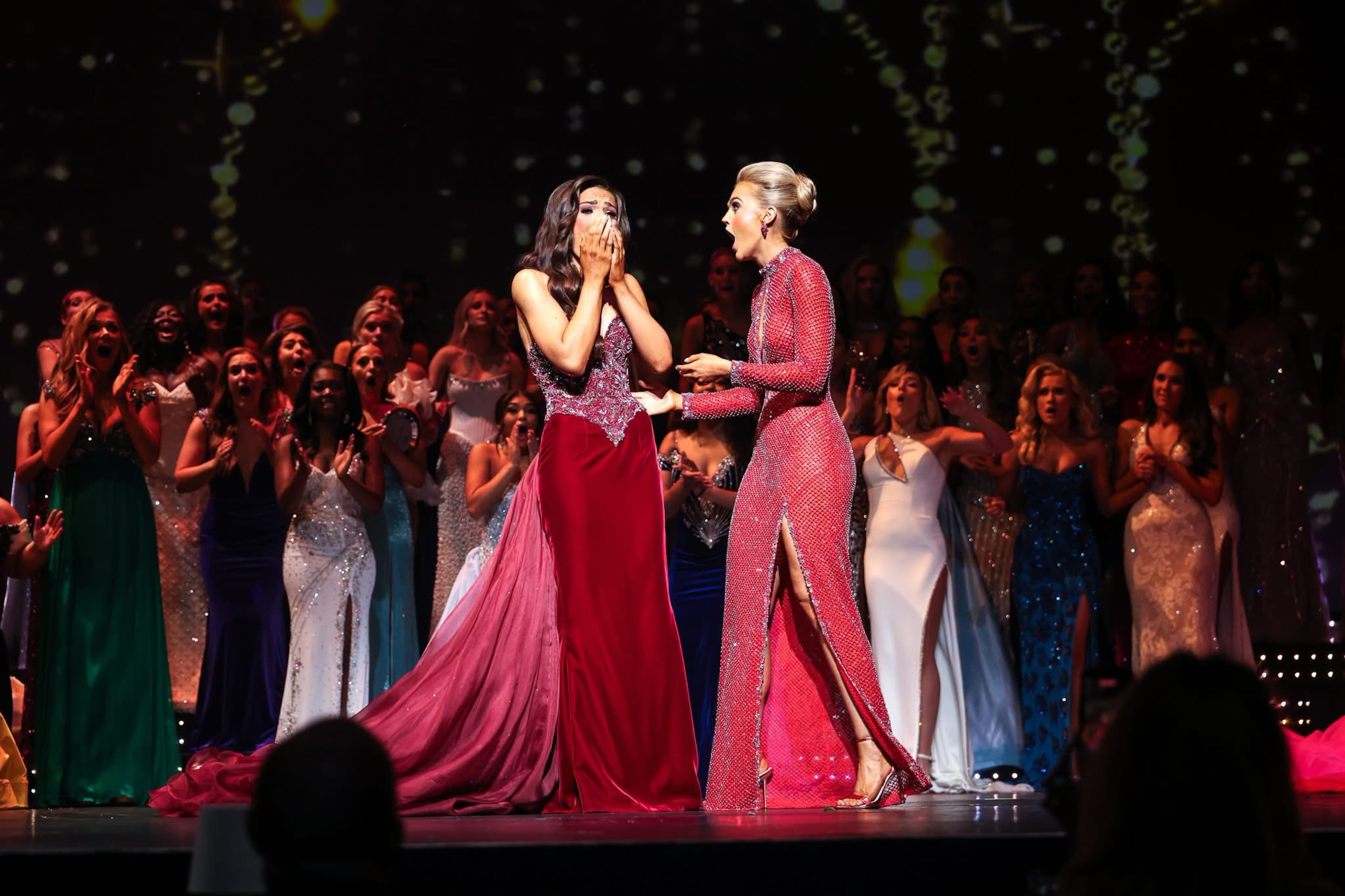 Aleks Arwood (right) and Sophia Wootten react during the crowning moment of the Miss Georgia Scholarship Competition on June, 20 2026. Arwood says she and Wooten are close friends, and is overjoyed that Wooten won. (Courtesy of Sheldon Smith Photography)