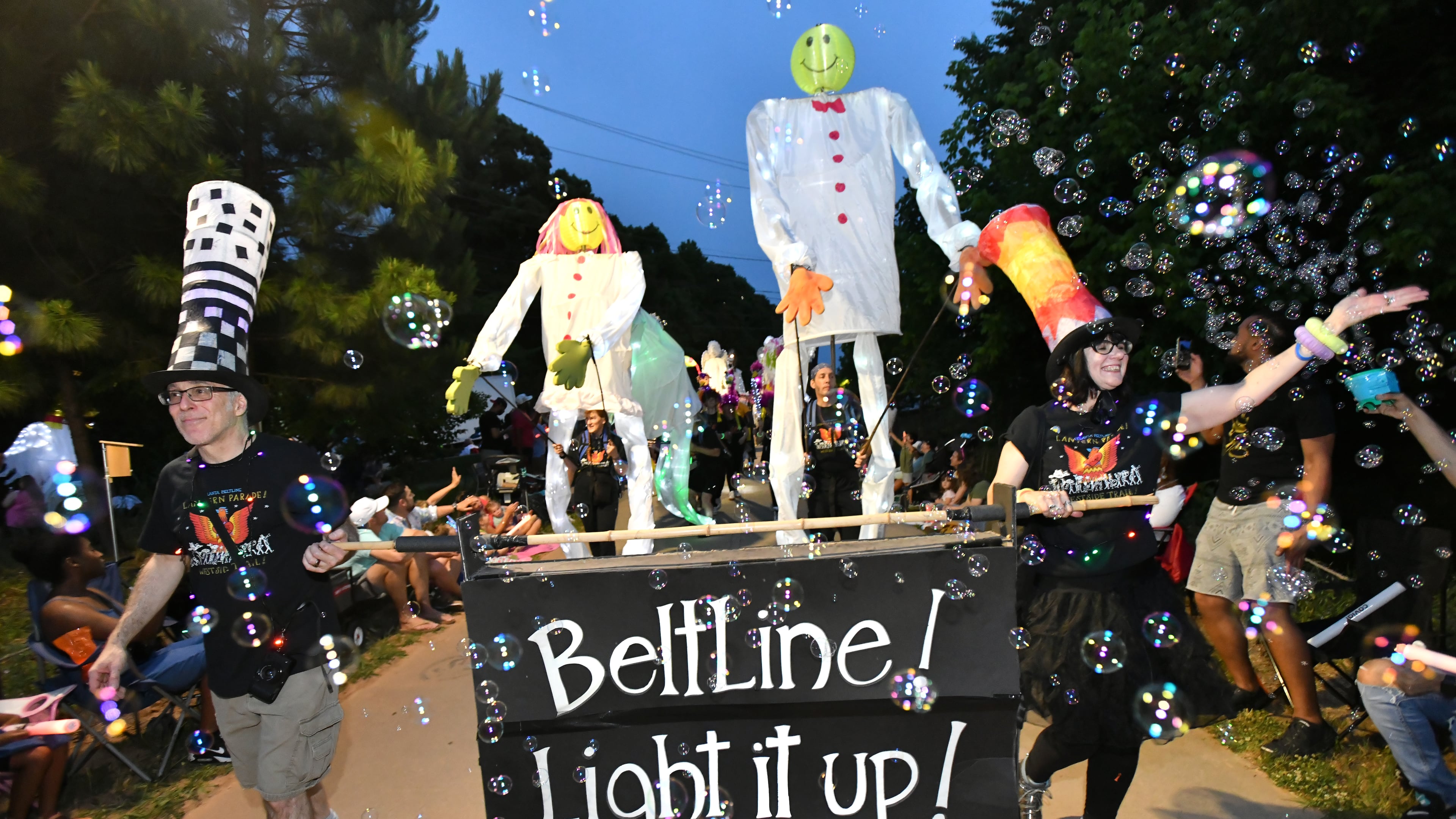 May 21, 2022 Atlanta - Thousands of participants and onlookers enjoy the 12th Atlanta Beltline Lantern Parade on the Atlanta Beltline Westside Trail on Saturday, May 21, 2022. In 2010, the Lantern Parade set out to encourage people to discover the unpaved Atlanta Beltline. Chantelle Rytter and the Krewe of the Grateful Gluttons submitted a performance proposal for the first year of Art on the Atlanta Beltline that called for people to make lanterns and join them for a nighttime stroll along the then-dirt Eastside Trail. The first parade garnered roughly 400 participants and no spectators. The Krewe ultimately succeeded in their mission – the parade grew to an estimated 70,000 participants and viewers in 2019. (Hyosub Shin / Hyosub.Shin@ajc.com)