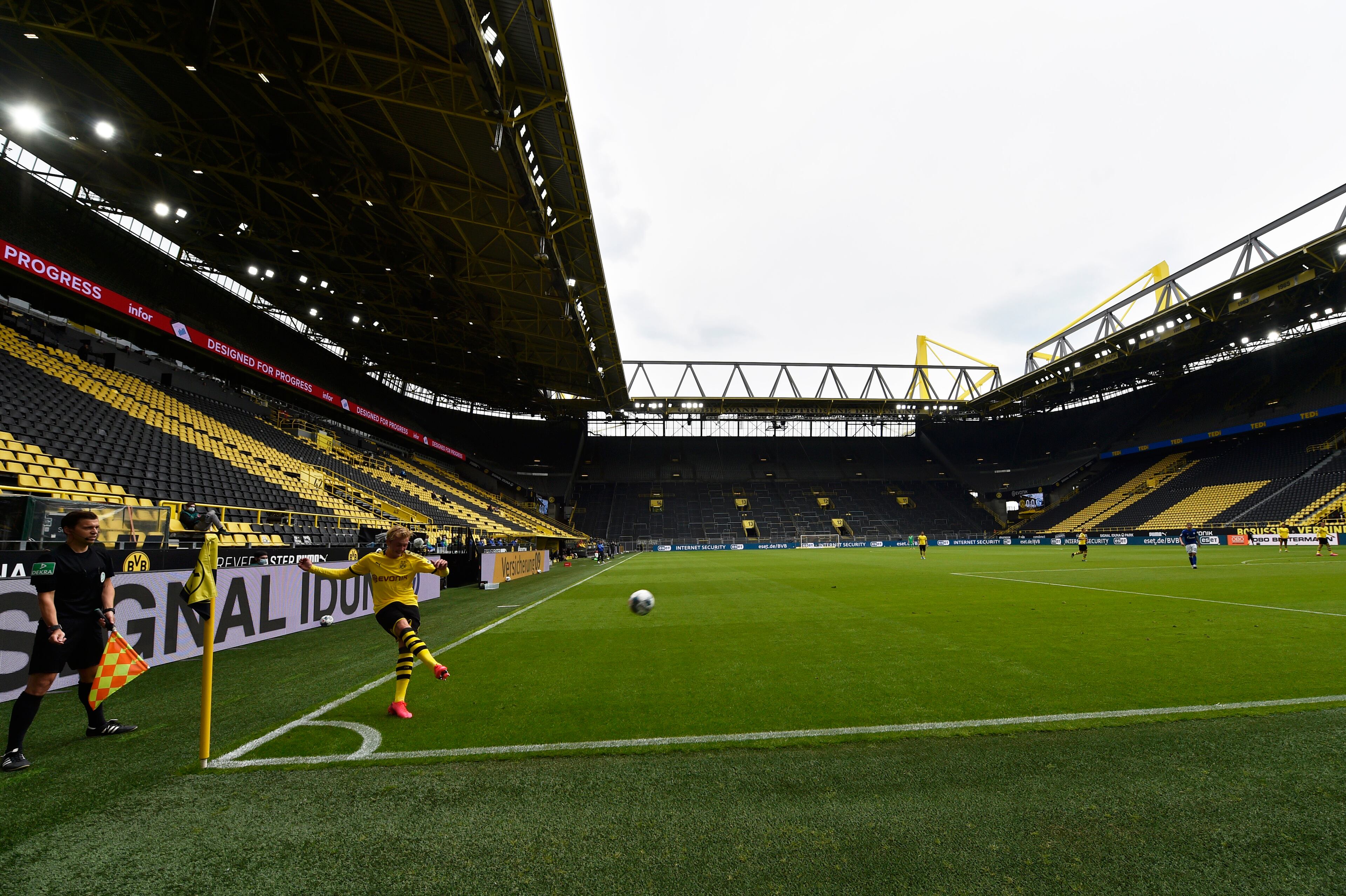 Dortmund's Erling Haaland kicks the ball during the German Bundesliga soccer match between Borussia Dortmund and Schalke 04 in Dortmund, Germany, Saturday, May 16, 2020. The German Bundesliga becomes the world's first major soccer league to resume after a two-month suspension because of the coronavirus pandemic. (AP Photo/Martin Meissner, Pool)