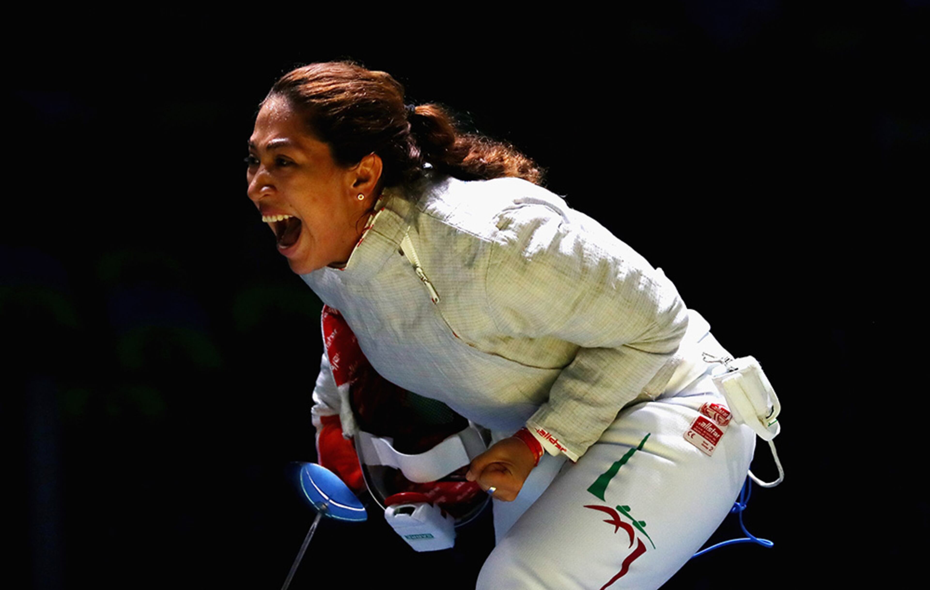 Ursula Gonzalez Garate of Mexico celebrates victory over Julieta Toledo of Mexico during the Women's Individual Sabre on Day 3 of the Rio 2016 Olympic Games at Carioca Arena 3 on August 8, 2016 in Rio de Janeiro, Brazil. (Photo by Dean Mouhtaropoulos/Getty Images)