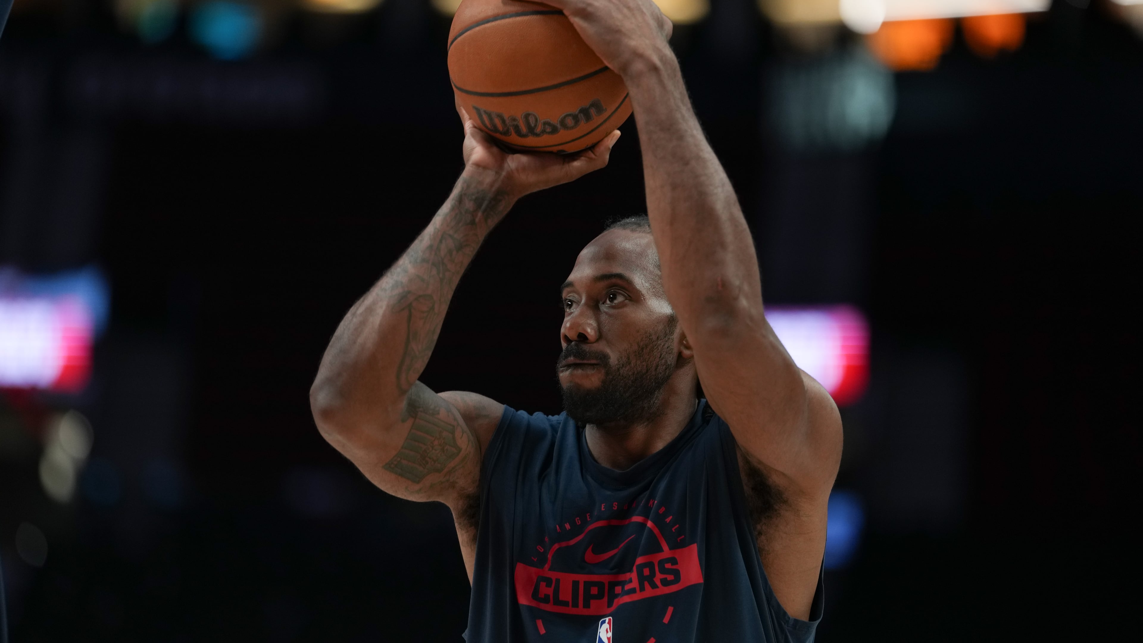 FILE - Los Angeles Clippers forward Kawhi Leonard warms up before an NBA basketball game April 10, 2026, in Portland, Ore. (AP Photo/Jenny Kane, File)