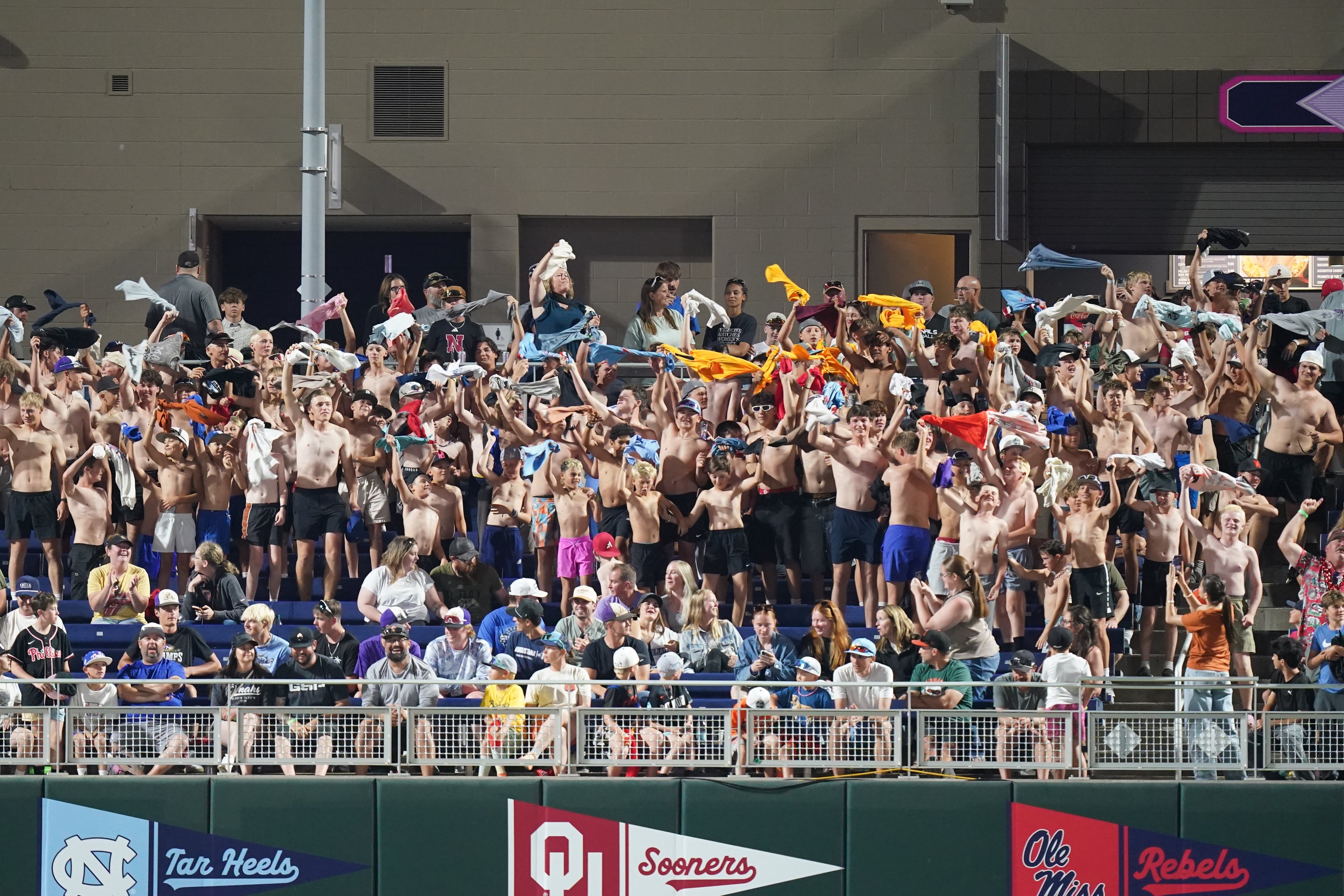 Baseball fans cheer in the stands during an NCAA baseball College World Series elimination game between Georgia and Texas, Tuesday, June 16, 2026 in Omaha, Neb. Georgia won 2-0. (AP Photo/Vera Nieuwenhuis)