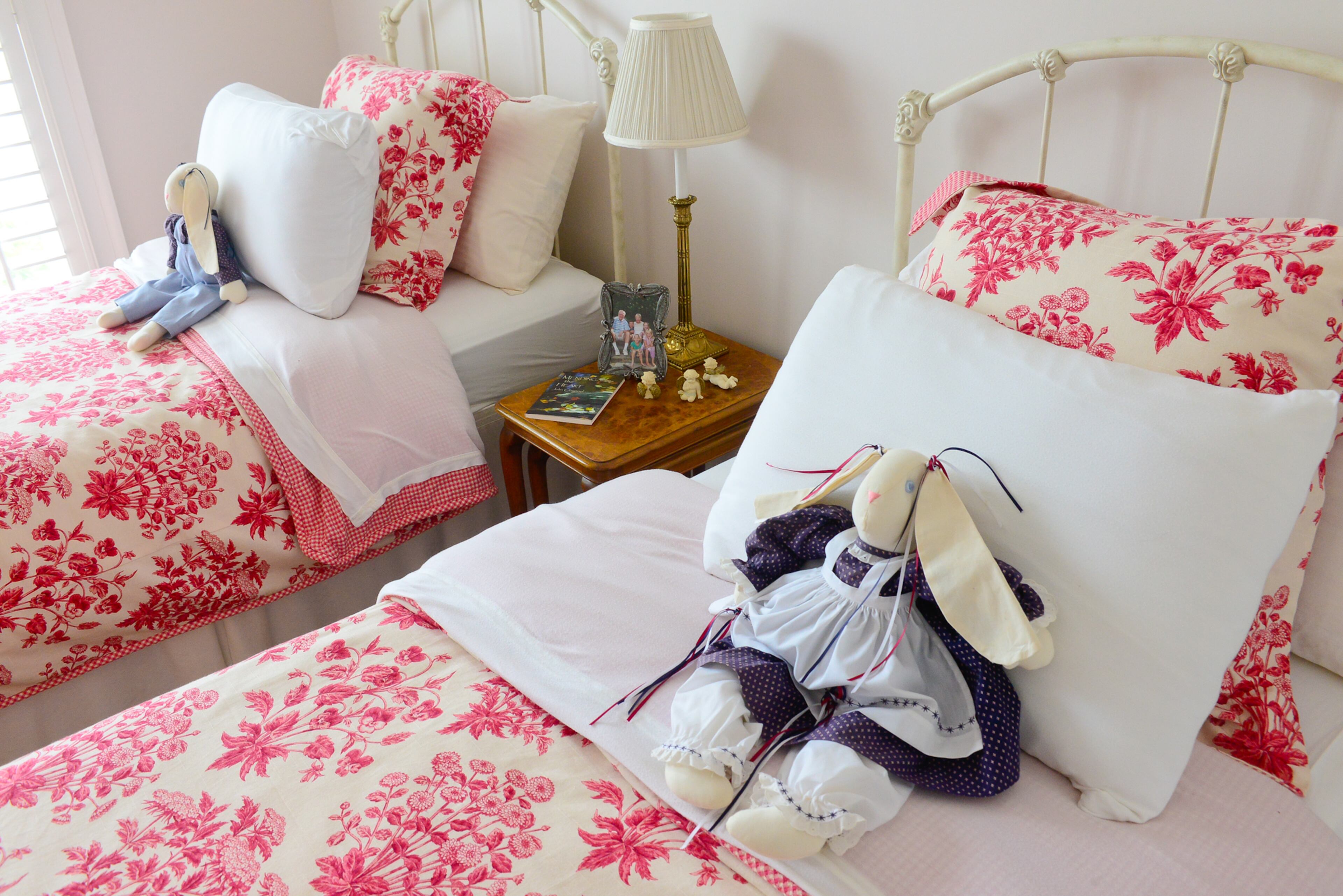 With three granddaughters and a grandson, their guest space can fill up quickly. One of the guest beds conceals a trundle, so all three girls can stay together if they sleep over.