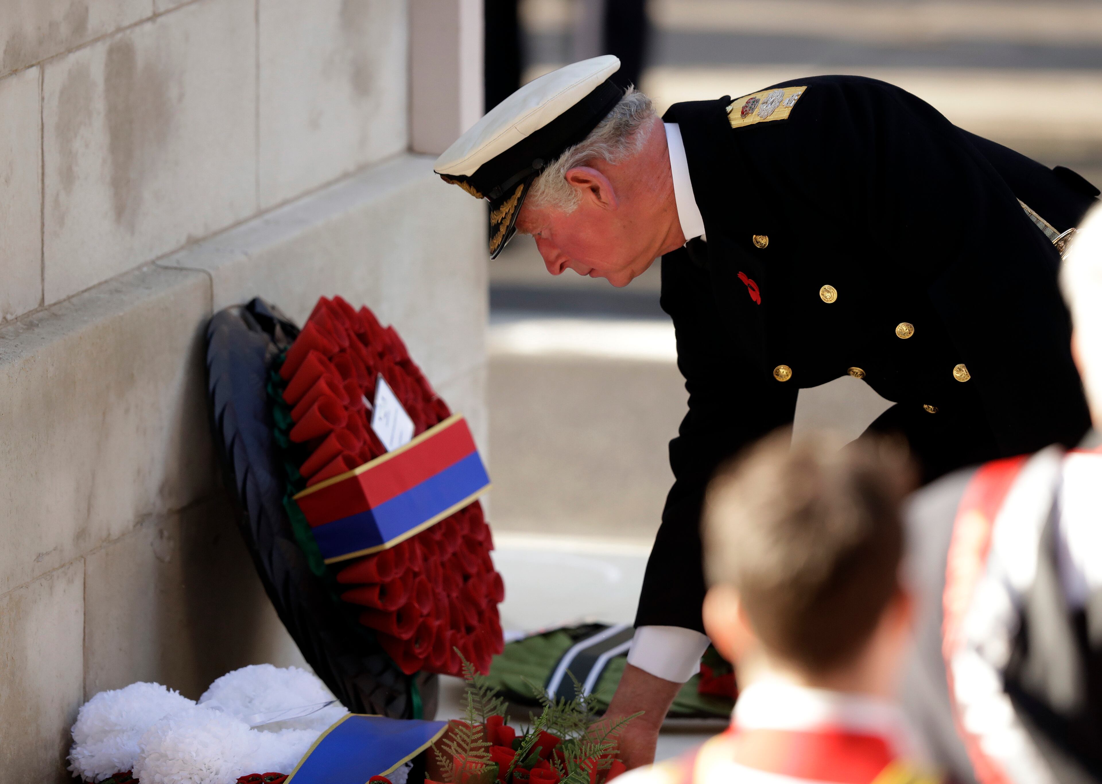 Britain's Prince Charles lays a wreath during the Remembrance Sunday ceremony at the Cenotaph in Whitehall in London, Sunday, Nov. 10, 2019. Remembrance Sunday is held each year to commemorate the service men and women who fought in past military conflicts. (AP Photo/Matt Dunham)