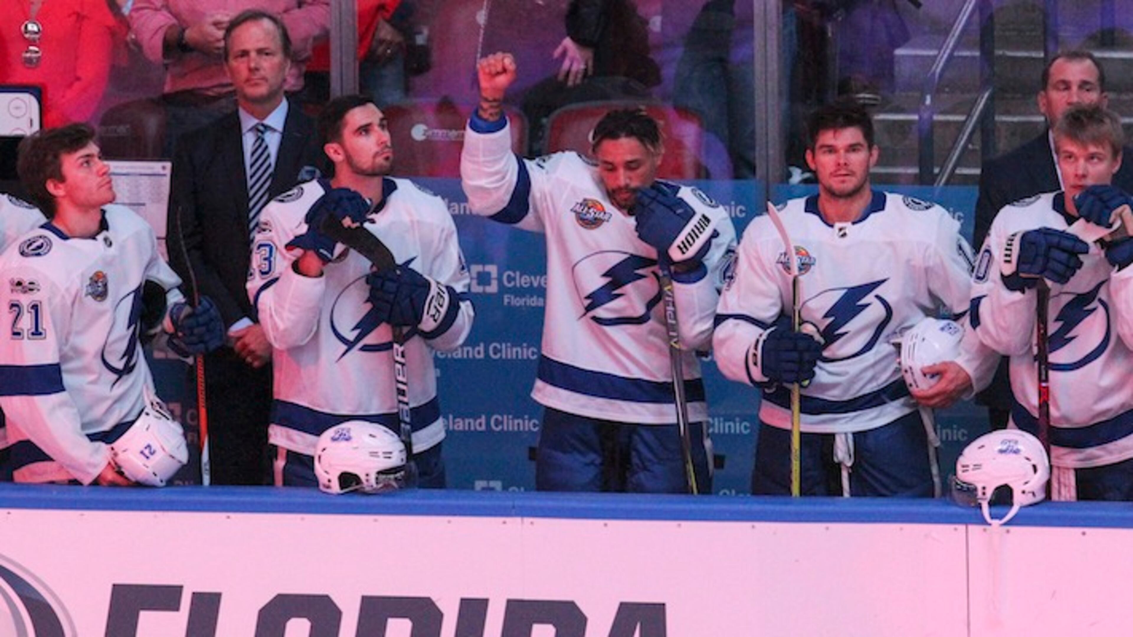 The Tampa Bay Lightning's J.T. Brown protests during the national anthem before the start of a game against the Florida Panthers at the BB&T Center in Sunrise, Fla., on October 7, 2017. (Matias J. Ocner/Miami Herald/TNS)