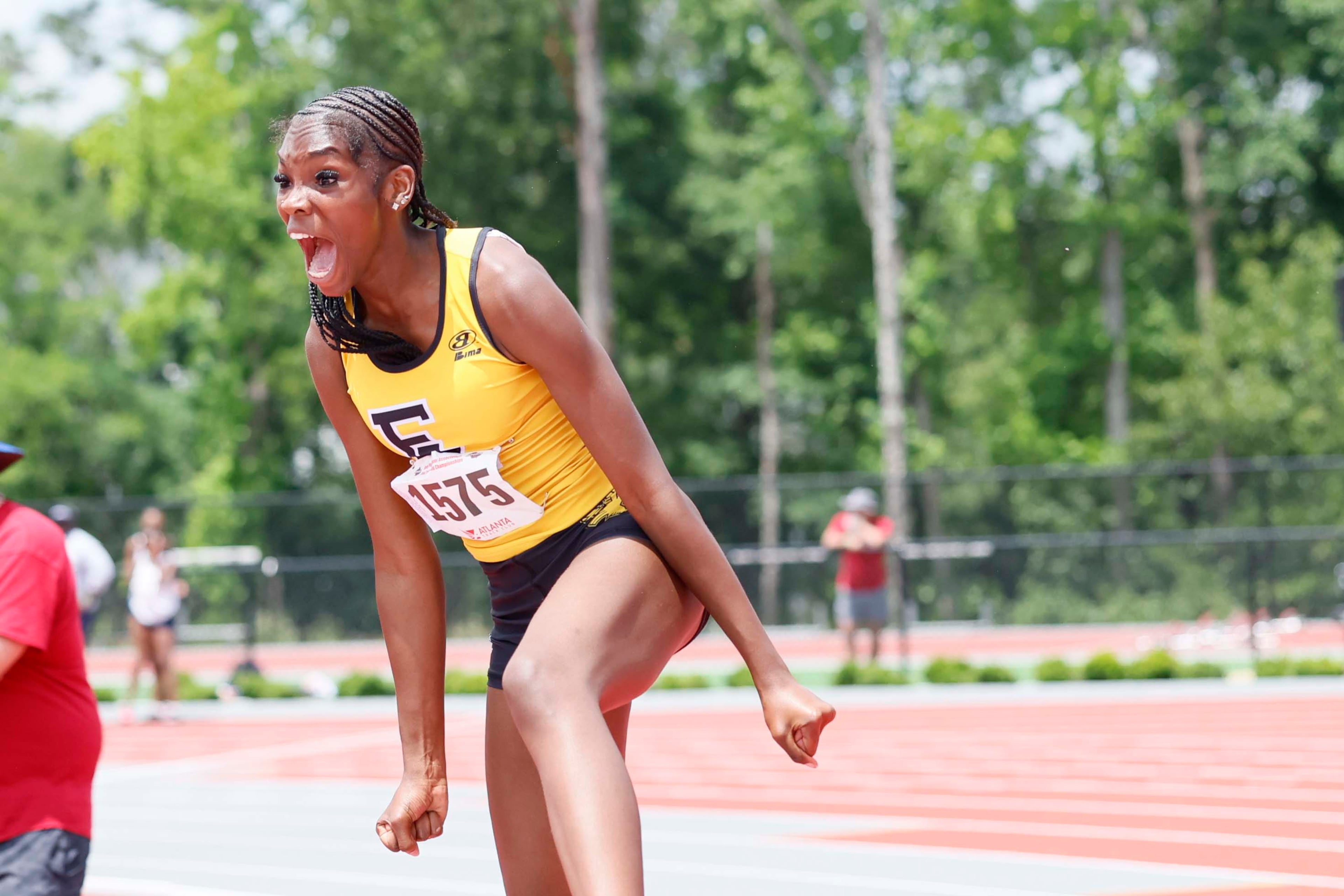 Eagle’s Landing High School’s Savanna Wade reacts after clearing 5’8" in the Girls High Jump AAAA to win the event during the GHSA Track and Field State Championship at UGA Spec Towns Track on Monday, May 11, 2026, in Athens. (Miguel Martinez/AJC)