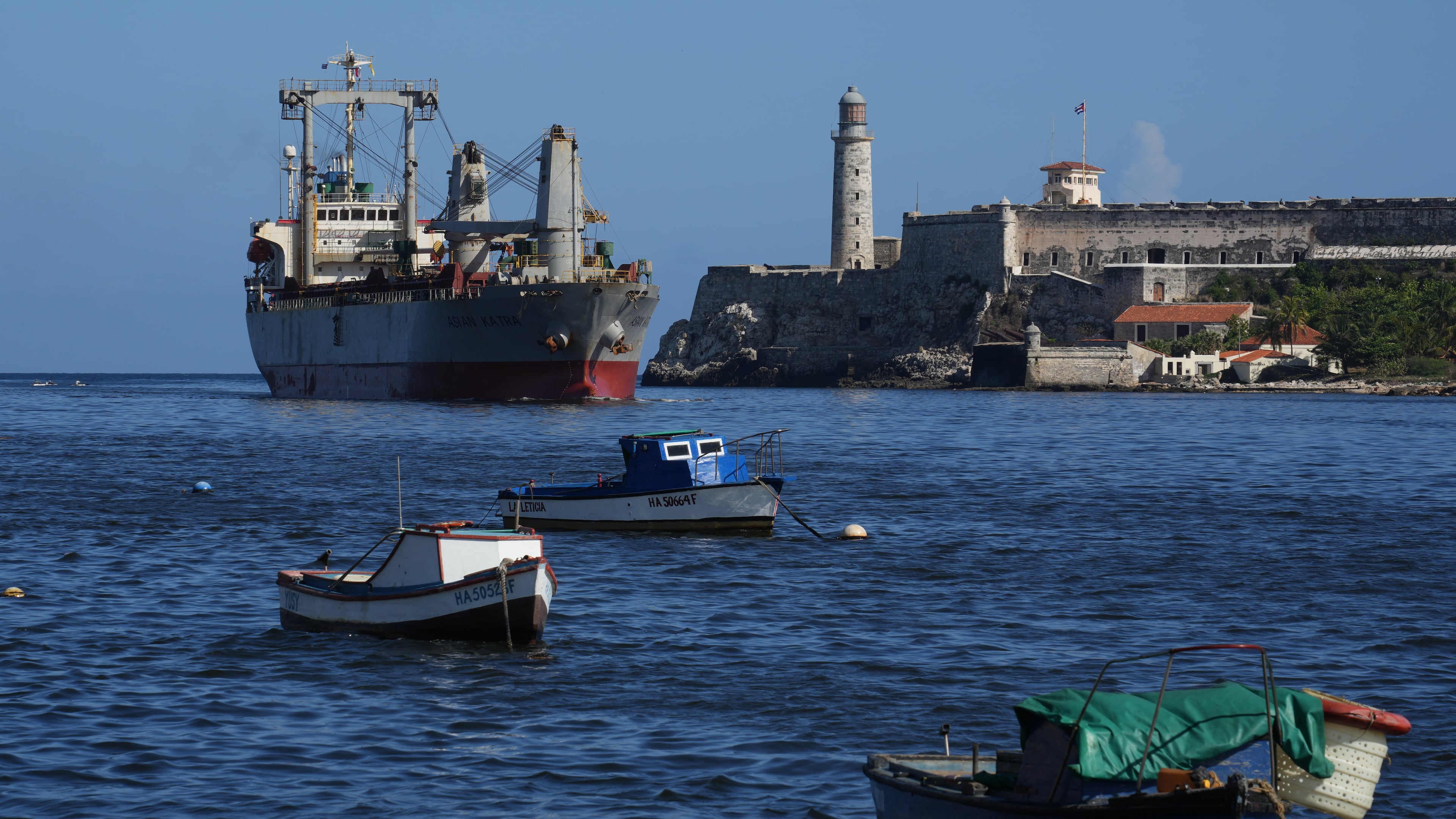 The Asian Katra cargo ship, top left, arrives in Havana Bay in Havana, Cuba, Monday, May 18, 2026. (AP Photo/Ramon Espinosa)