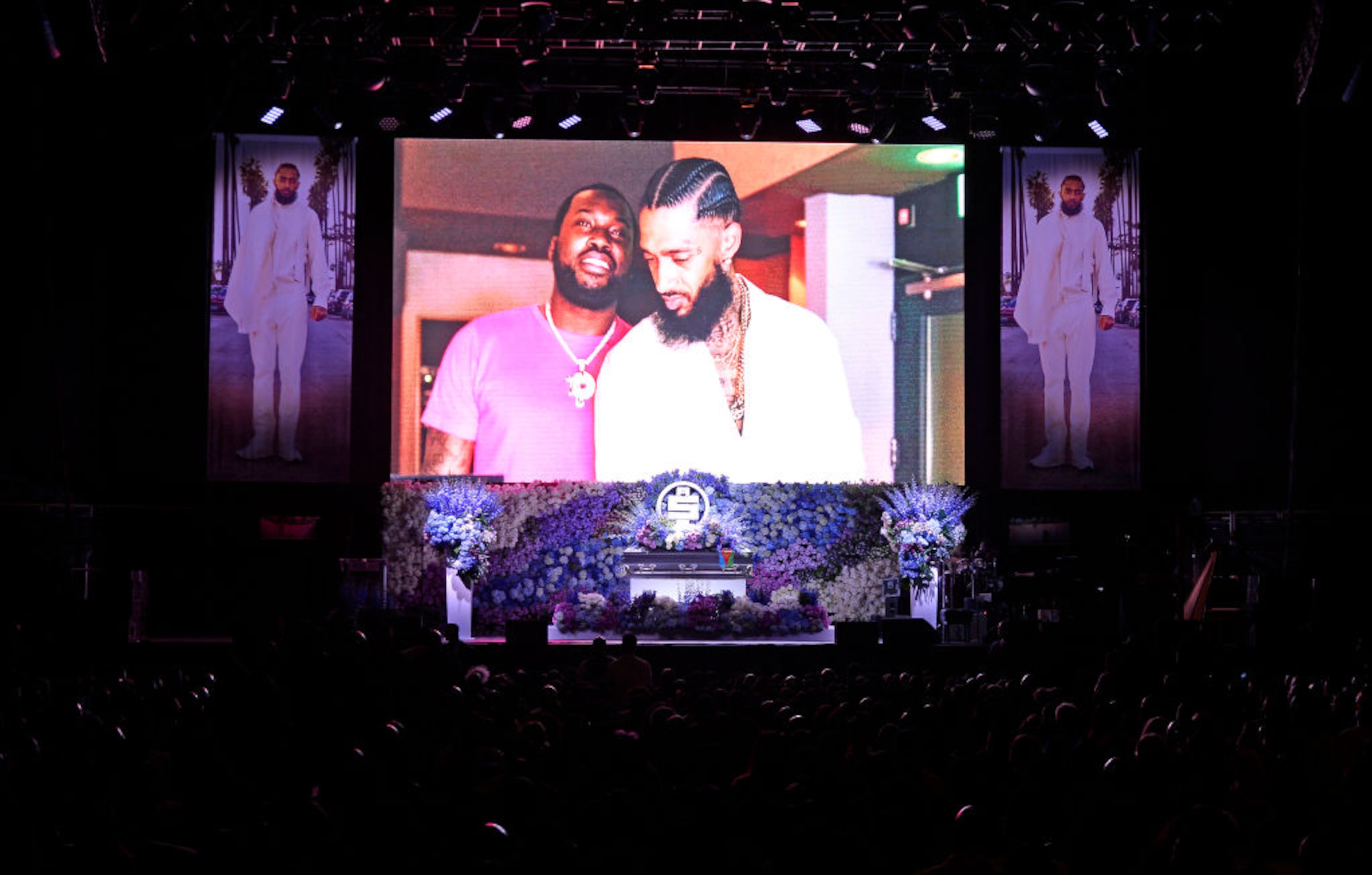 LOS ANGELES, CALIFORNIA - APRIL 11: (EDITORS NOTE: All images taken by Getty Images inside the Staples Center at Nipsey Hussle's Celebration of Life have been reviewed and approved for distribution by Atlantic Records) Photos are displayed during Nipsey Hussle's Celebration of Life at STAPLES Center on April 11, 2019 in Los Angeles, California. Nipsey Hussle was shot and killed in front of his store, The Marathon Clothing, on March 31, 2019 in Los Angeles. (Photo by Kevork Djansezian/Getty Images For Atlantic Records)