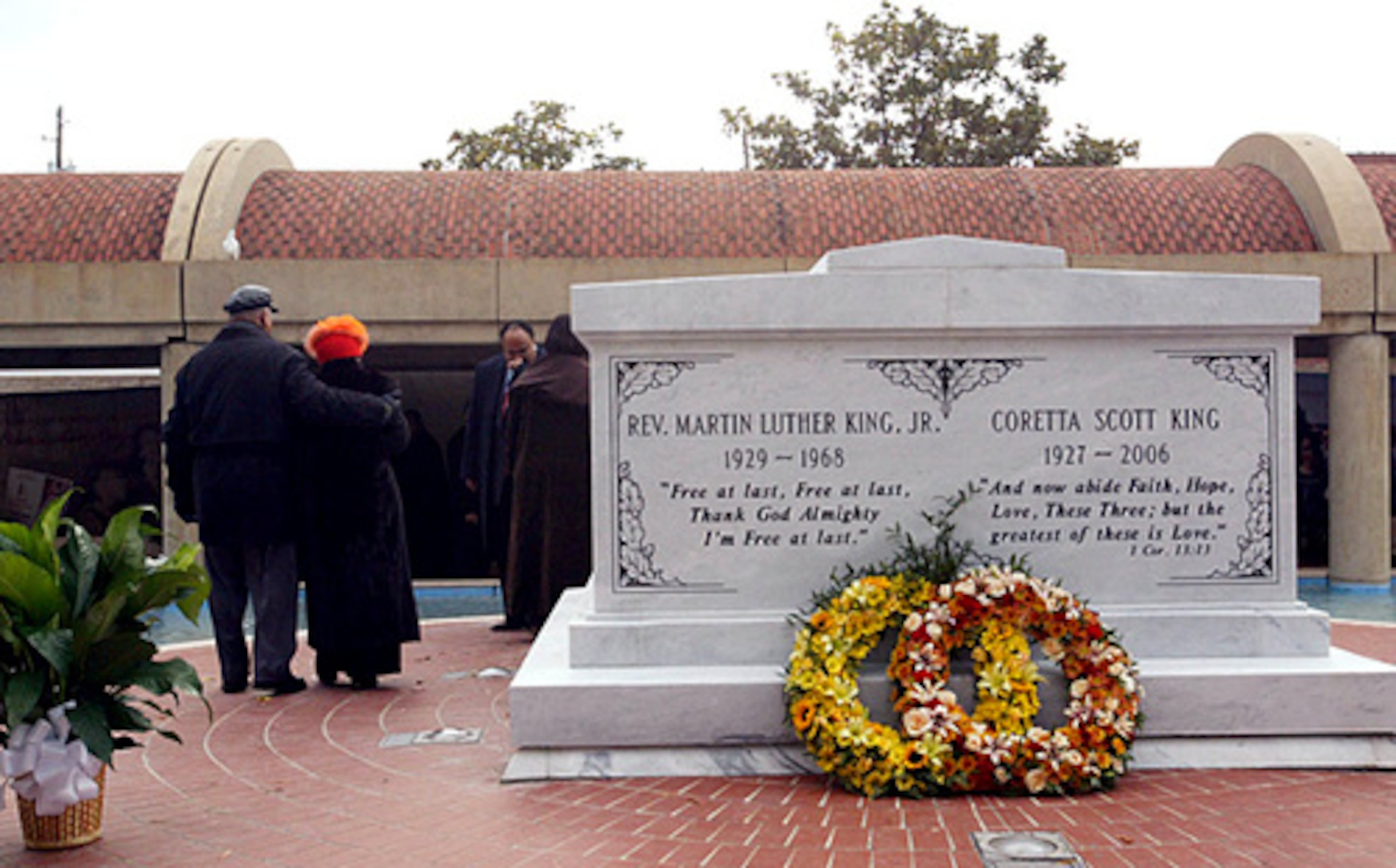 November 2006: Christine King Farris and her husband, Issac Farris, walk away from the crypt after the ceremony marking the permanent entombment of Martin Luther King Jr. and Coretta Scott King at the King Center.
