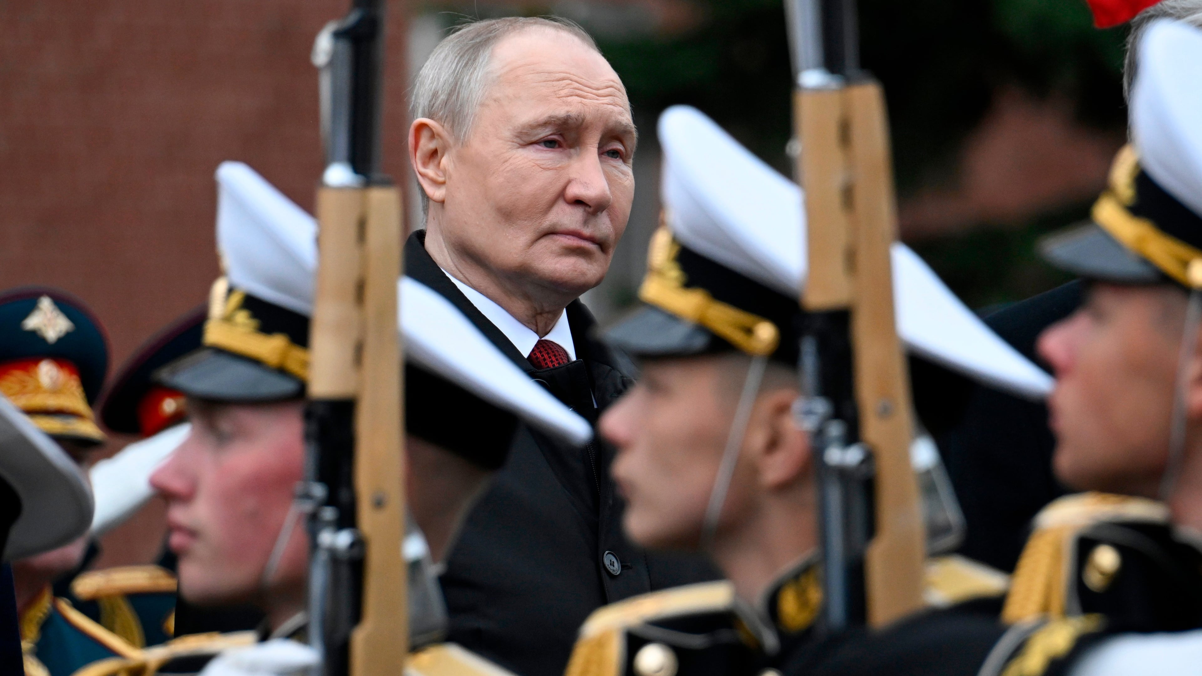 FILE - Russian President Vladimir Putin, rear center, attends a ceremony to lay flowers at the Tomb of the Unknown Soldier by the Kremlin wall in Moscow, Saturday, May 9, 2026, during celebrations of the 81st anniversary of the Soviet Union's victory over Nazi Germany during the World War II. (Alexander Nemenov/Pool Photo via AP, File)