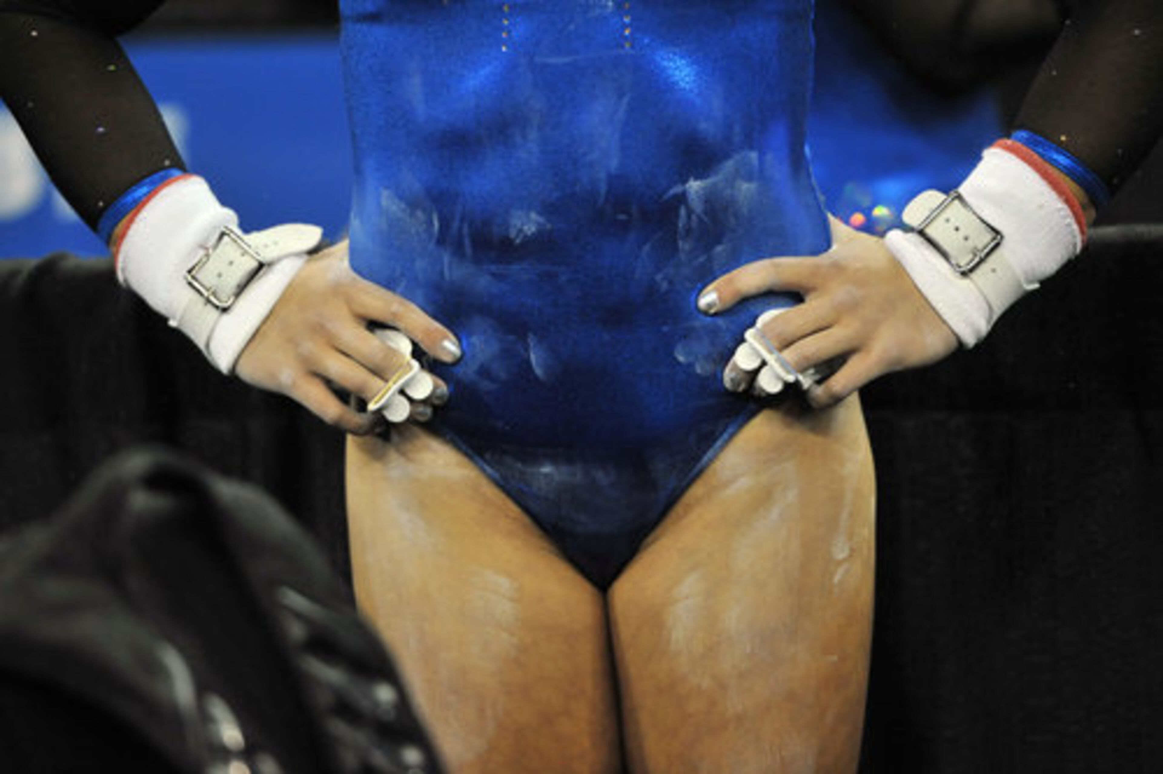 University of Kentucky's Caitlyn Ciokajlo prepares before competing on the bars.