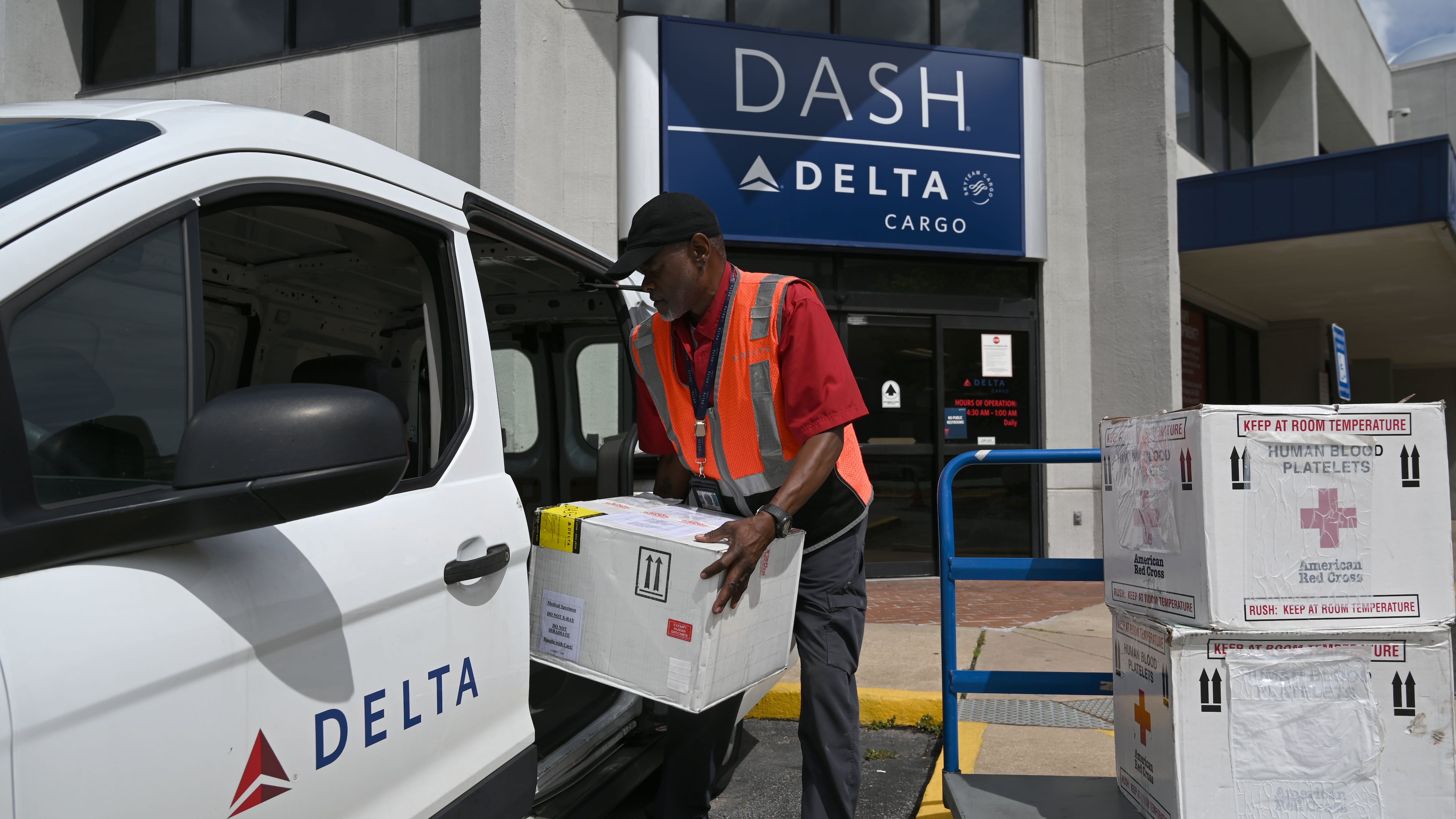 Kirkland Gibbs handles package drop-off at the Delta DASH office at Hartsfield-Jackson Atlanta International Airport on Thursday, May 28, 2026, in Atlanta. Delta DASH is Delta Air Lines’ same‑day express shipping service, providing fast air transport for time‑sensitive packages with priority handling across the airline’s domestic network. (Hyosub Shin/AJC)