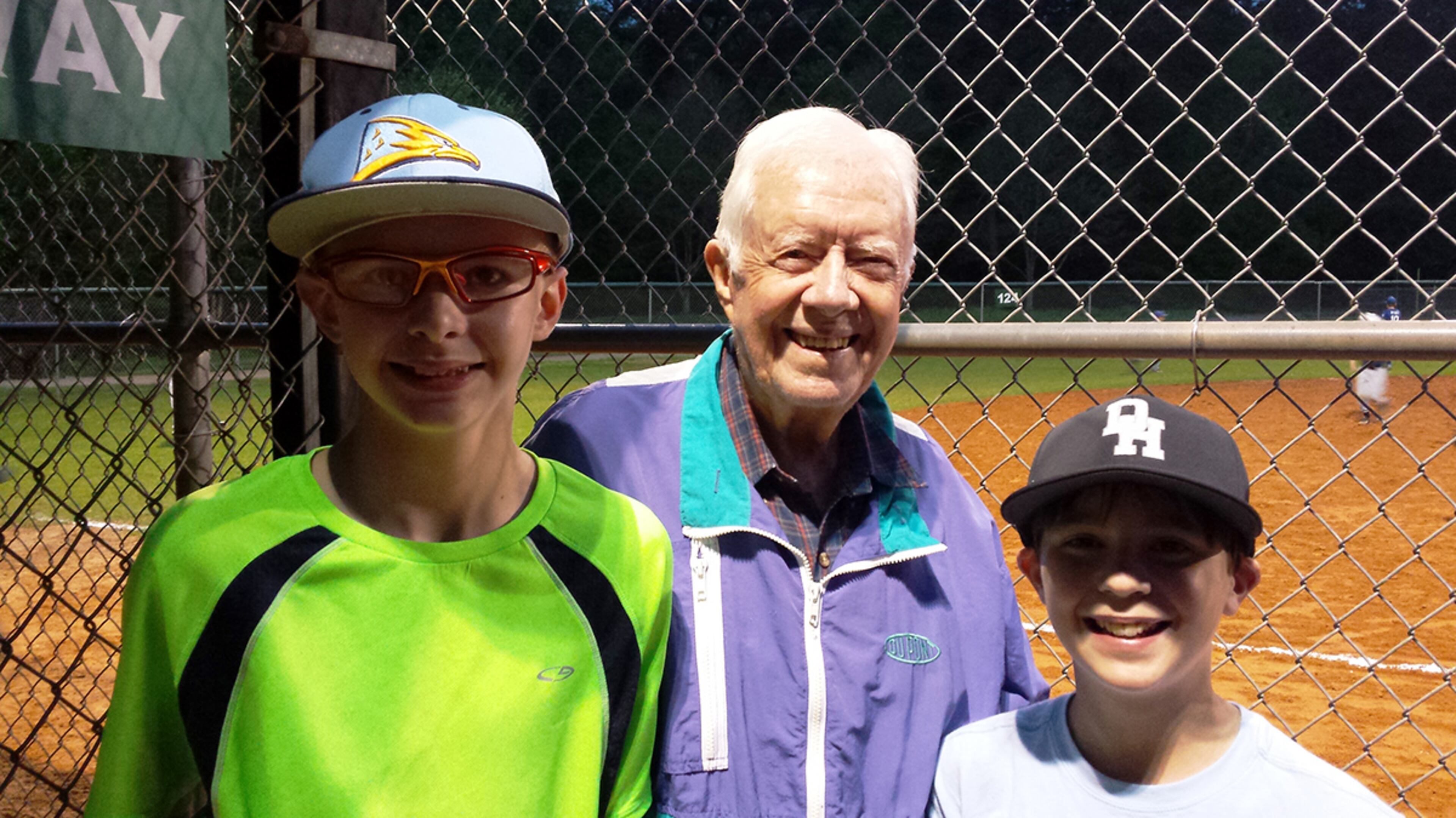 Julie Kooken: My 13-year-old son, Joseph Kooken (left), met Jimmy Carter one evening this past April. His great-grandson played in one of the leagues there this spring. President Carter even kept score for the team for a while. He graciously agreed to have his picture taken with my son and his friend, Jacob Suever, after my son told President Carter, "Go Navy! Beat Army!"