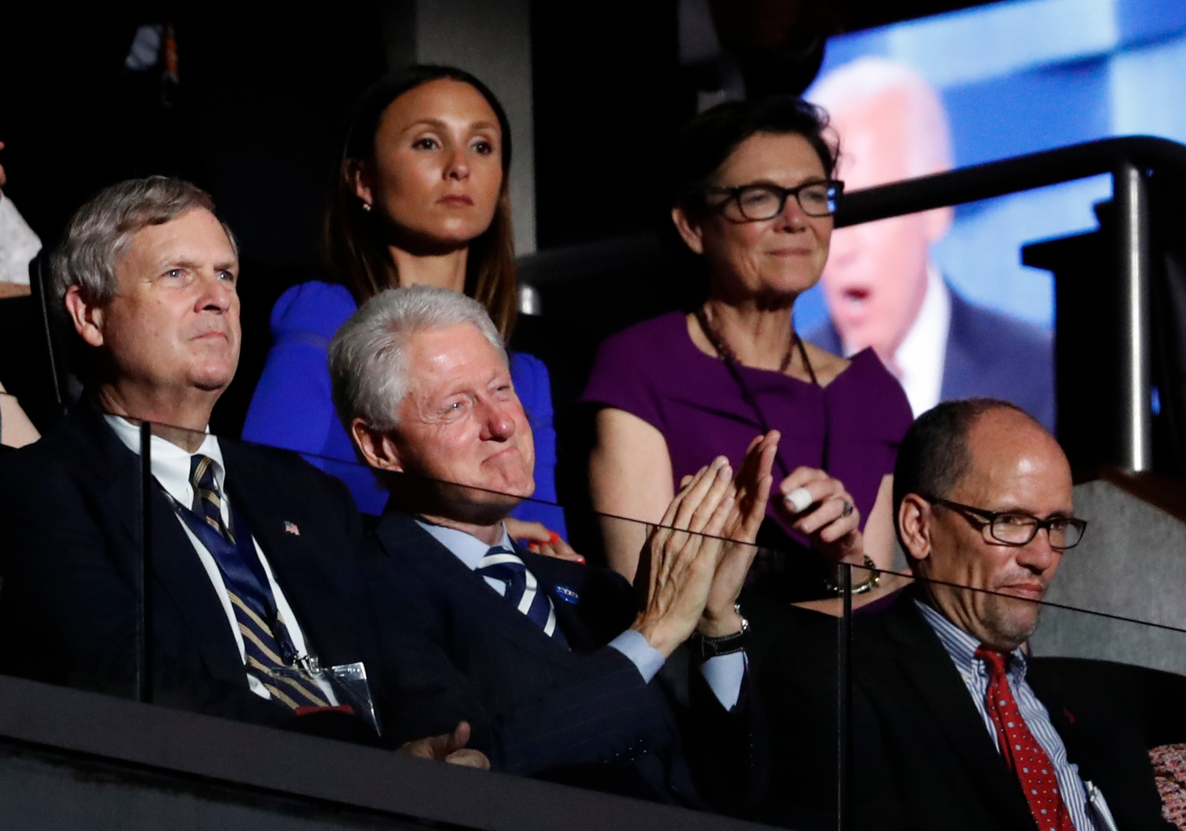 Former President Bill Clinton applauds while Vice President Joe Biden speaks during the third day of the Democratic National Convention in Philadelphia, Wednesday, July 27, 2016. (AP Photo/Paul Sancya)