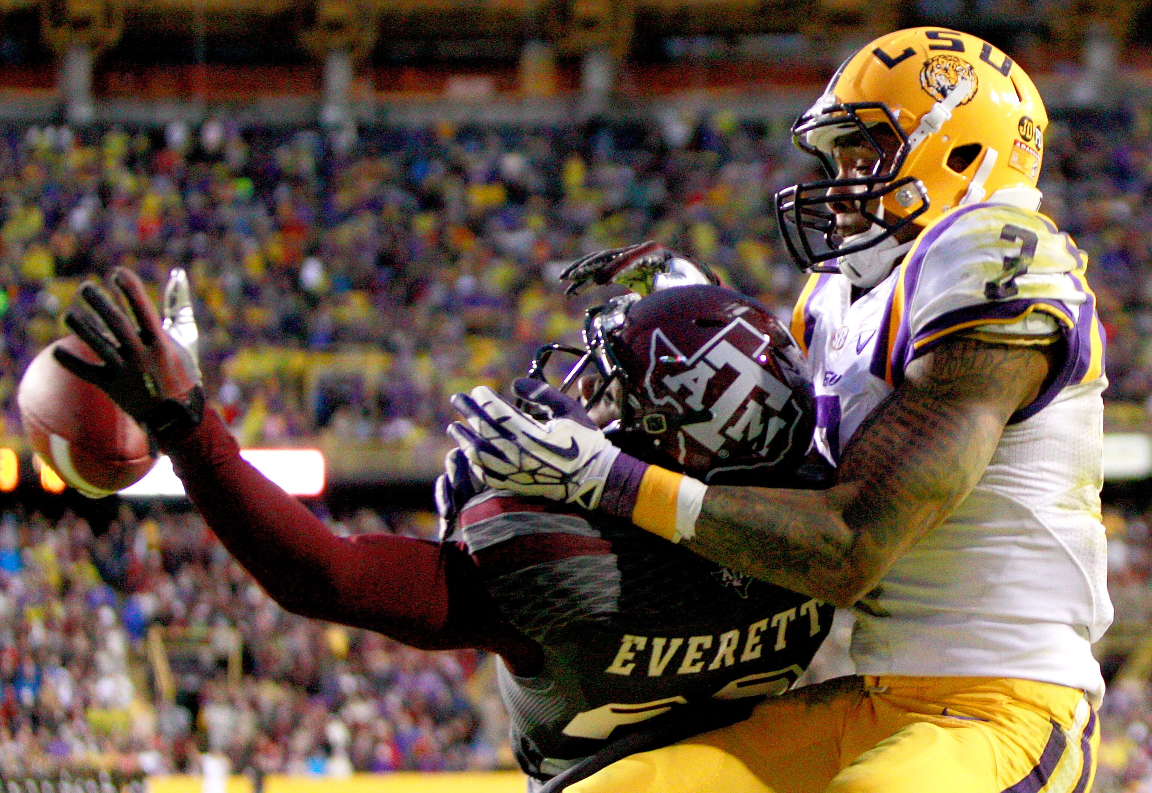Defensive back Deshazor Everett of Texas A&M breaks up a pass intended for wide receiver Odell Beckham Jr. of LSU at Tiger Stadium on Nov. 23, 2013. (Photo by Sean Gardner/Getty Images)