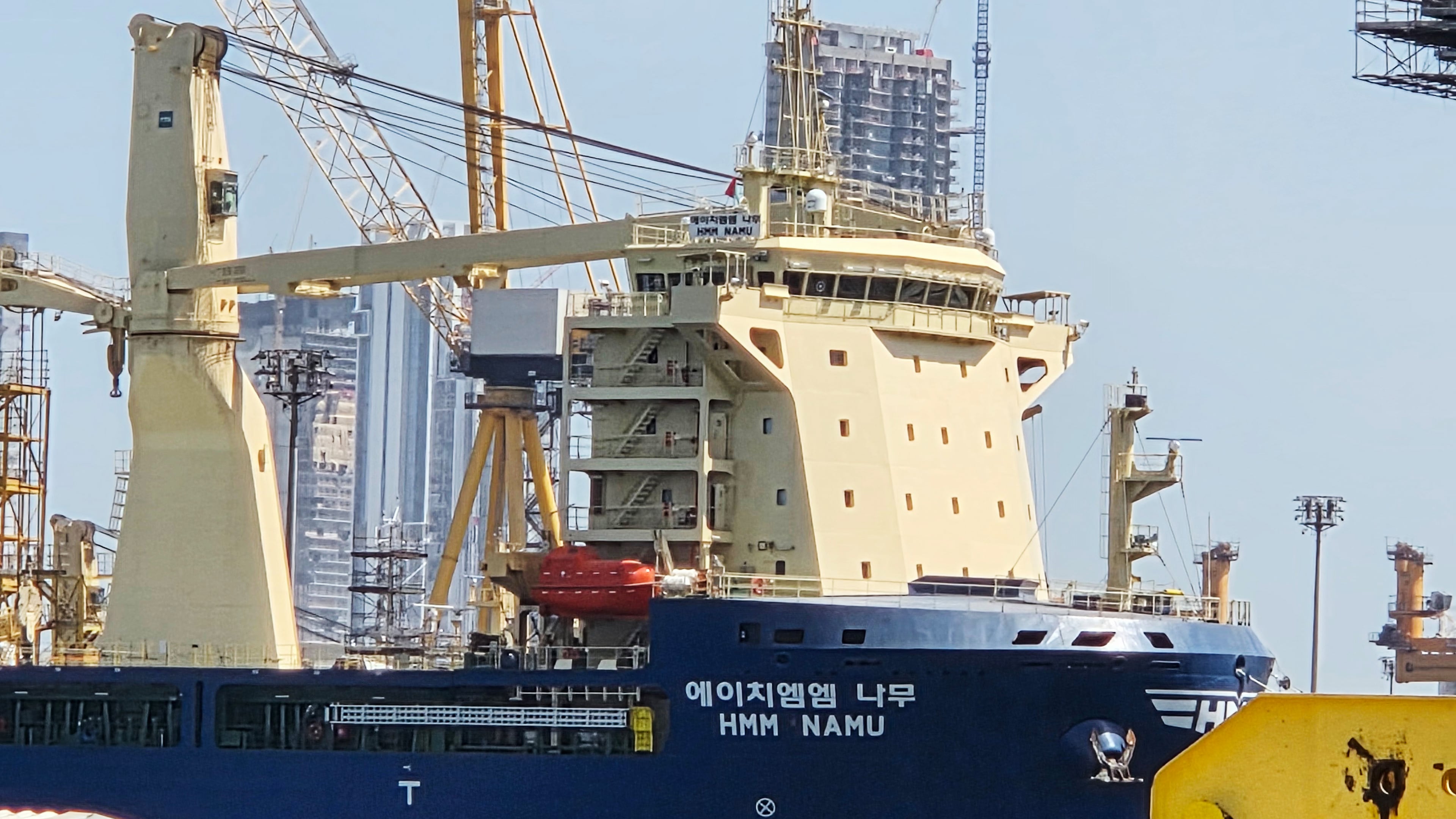 The South Korean-operated vessel HMM NAMU is docked after being damaged from a fire following an explosion in the Strait of Hormuz, at a port in Dubai, United Arab Emirates, Friday, May 8, 2026. (Kim Sang-hun/Yonhap via AP)