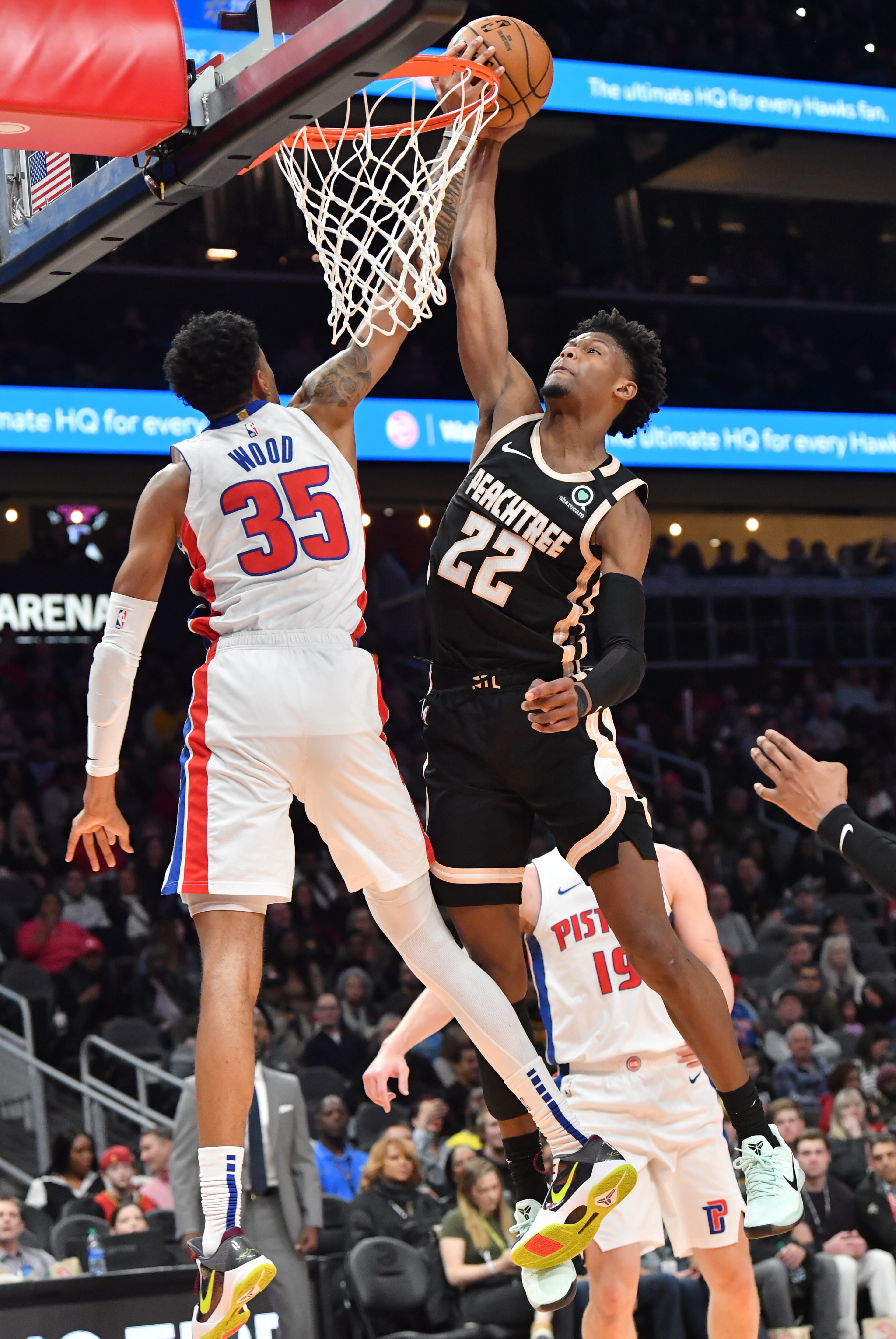 Detroit Pistons forward Christian Wood (35) blocks a shot by Atlanta Hawks forward Cam Reddish (22) in the first half during a NBA basketball game at State Farm Arena on Saturday, January 18, 2020. (Hyosub Shin / Hyosub.Shin@ajc.com)