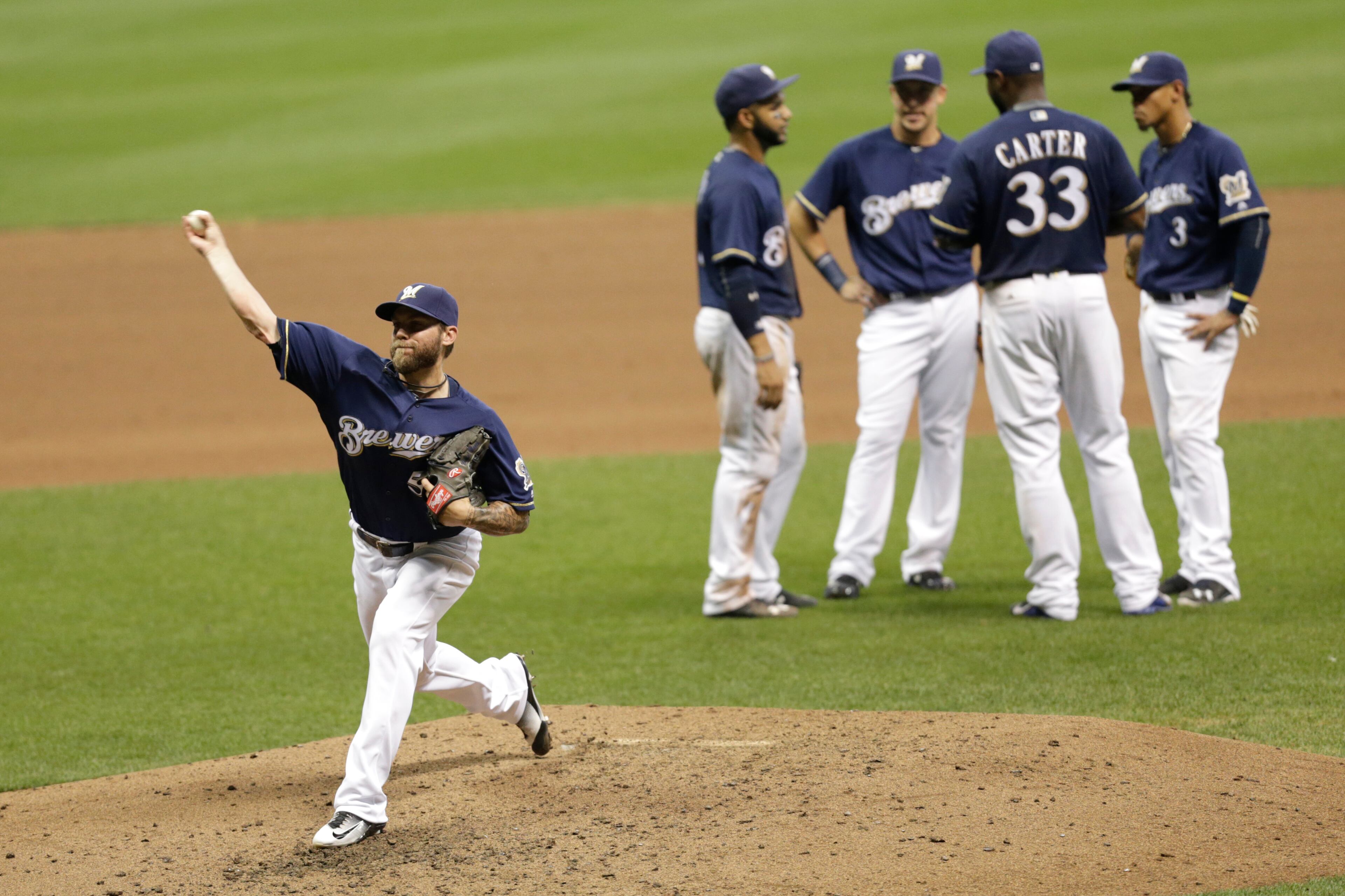 Michael Blazek #54 of the Milwaukee Brewers pitches during the seventh inning against the Atlanta Braves at Miller Park on August 09, 2016 in Milwaukee, Wisconsin. (Photo by Mike McGinnis/Getty Images)
