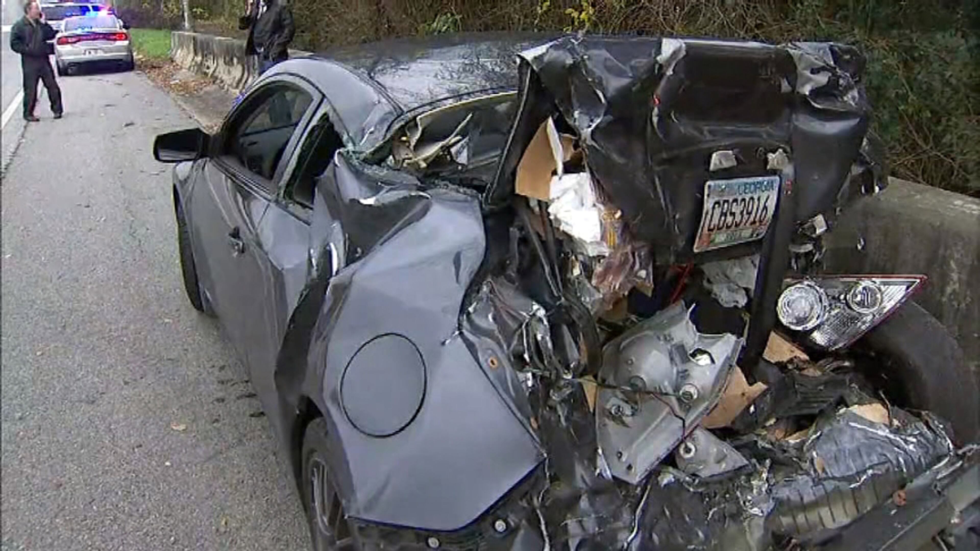 Nissan belonging to Tim Foust was seriously damaged when Foust was rear-ended by the suspect in a police chase. Foust said he was on his way home from work. Channel 2 Action News photo.