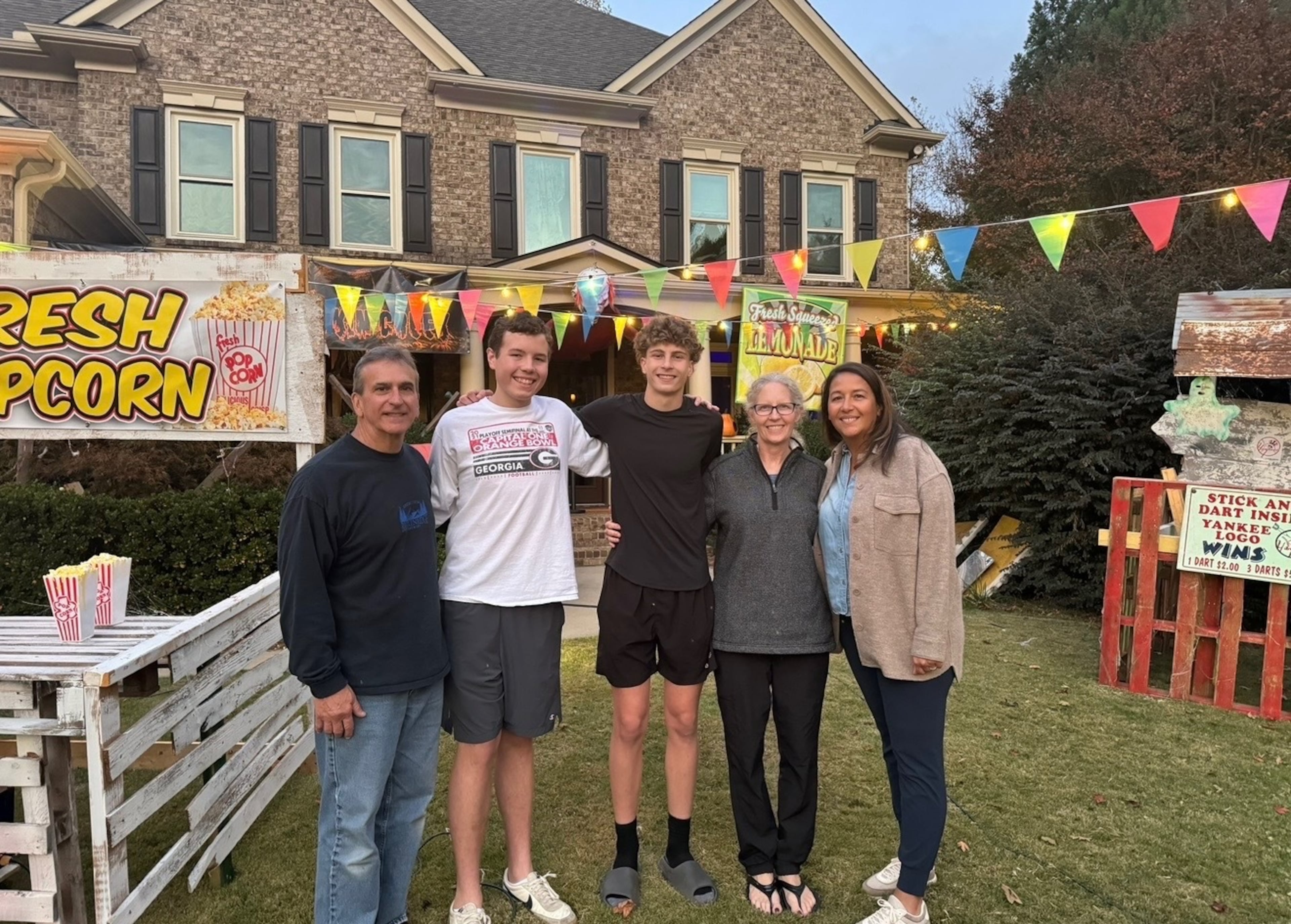 In this undated photo, Anthony Cabrera (from left), Jake Kowalzyk, Matthew Cabrera, Sandi Cabrera and Brandee Kowalzyk reunite at the Cabrera Family Haunted House. The families became friends when Jake was a Children’s Healthcare of Atlanta patient. (Courtesy of the Cabrera Family Haunted House)