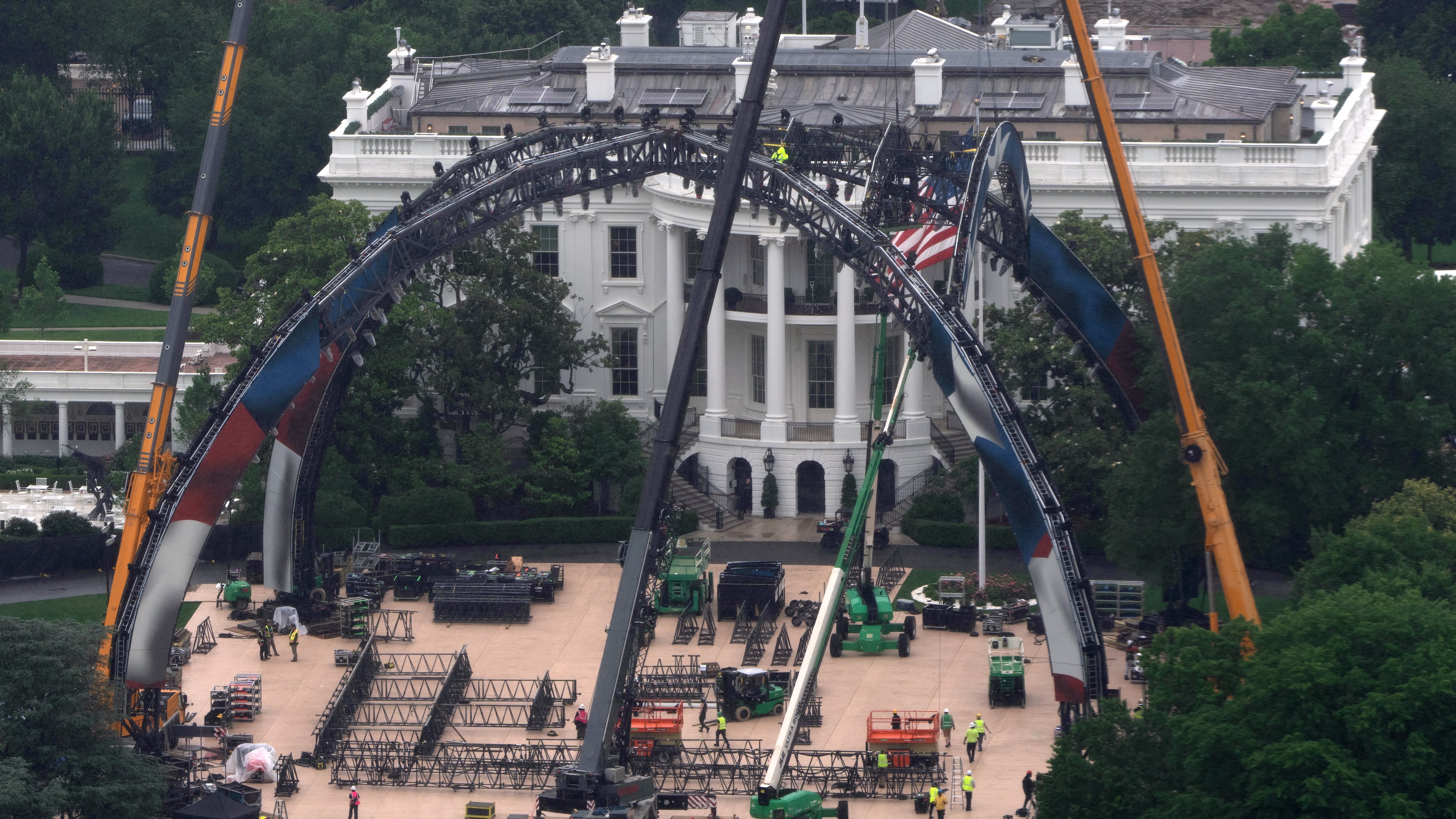 Equipment being placed on the South Lawn of the White House is seen from the Washington Monument, Tuesday, May 26, 2026, in Washington. The UFC is holding a mixed martial arts fight on June 14 as part of America 250 celebrations. (AP Photo/Mark Schiefelbein)
