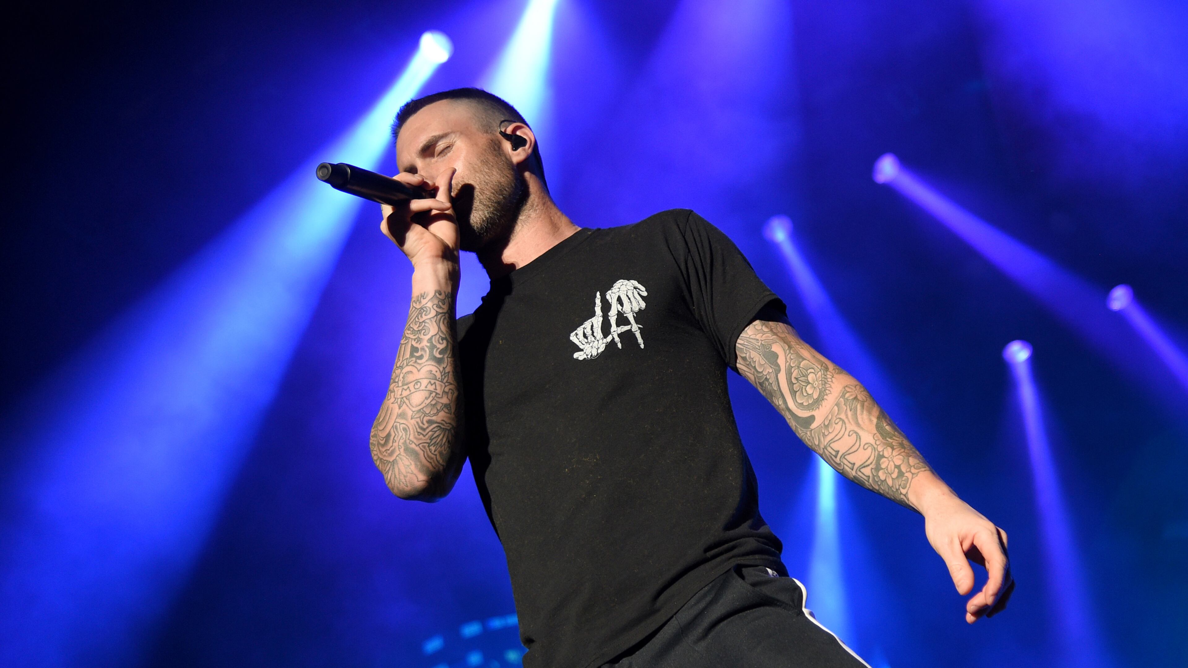 A fan was arrested after rushing toward Adam Levine of Maroon 5 on stage in Toronto. (Photo by Michael Loccisano/Getty Images for Turner)