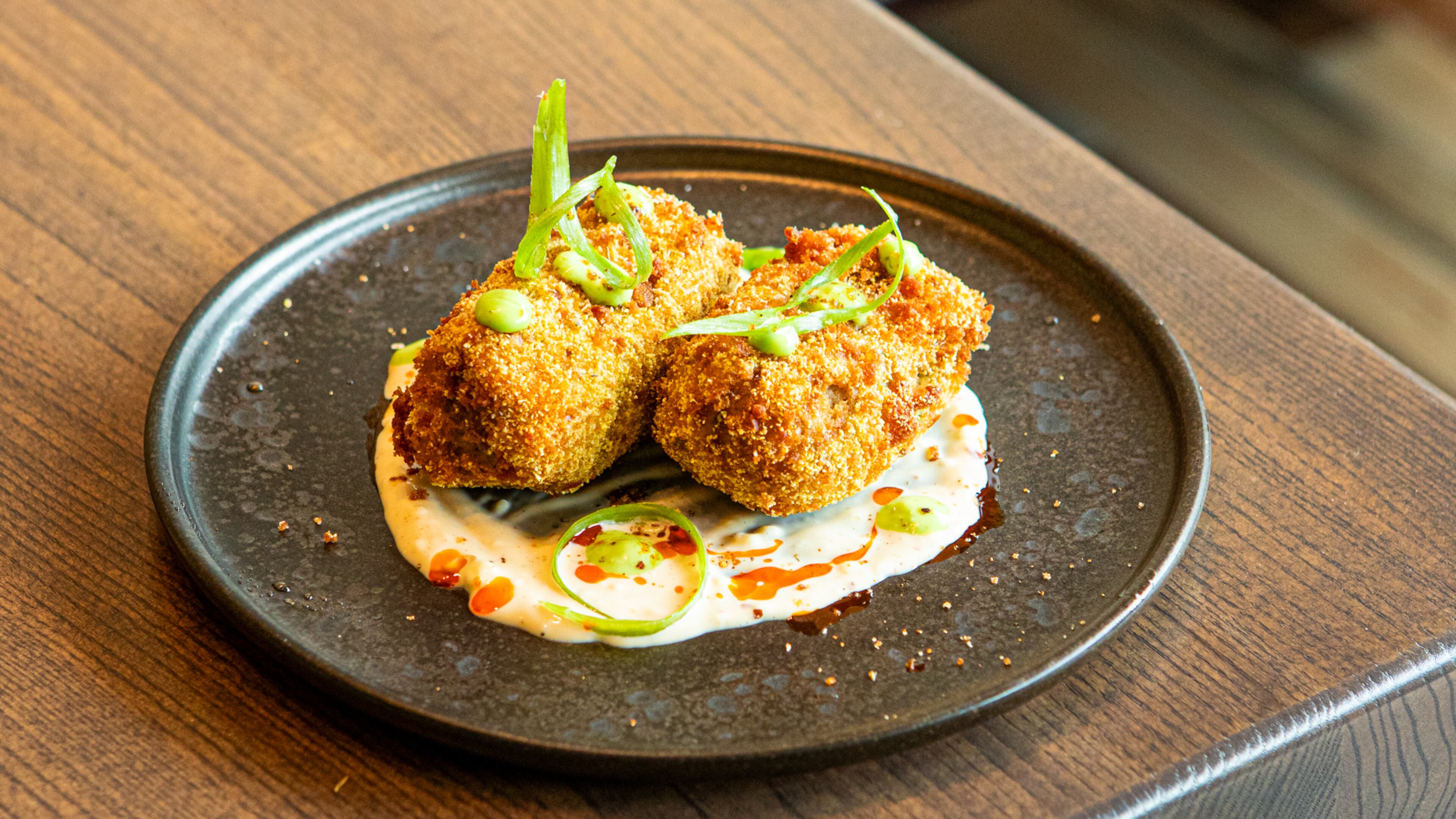The recipe for Auburn Angel's Seafood Croquettes are based on the salmon croquettes executive chef and co-owner Robert Butts ate as a child. (Aaliyah Man for the AJC)