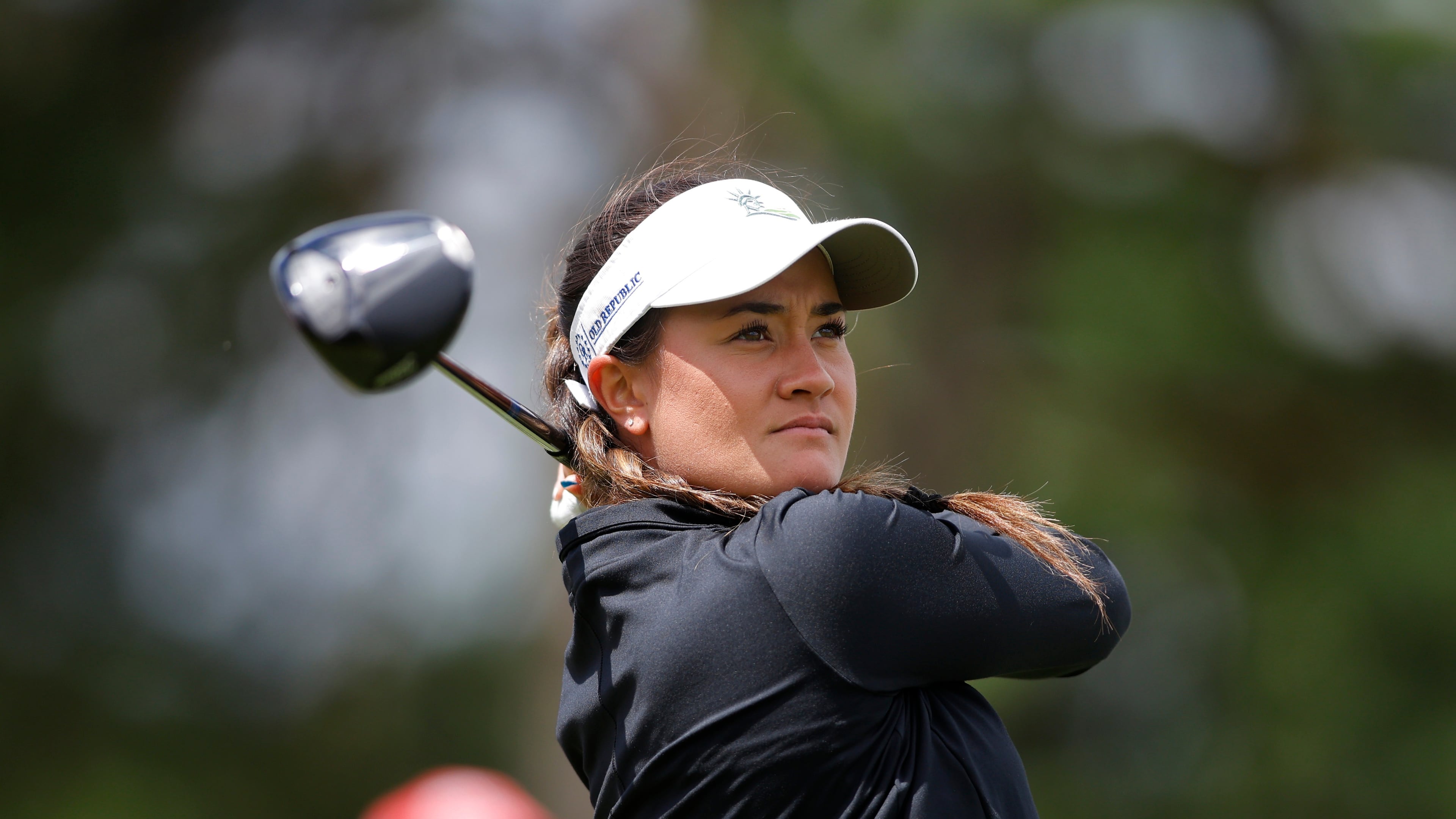 Kiara Romero watches her tee shot on the ninth hole during the first round of the Meijer LPGA Classic golf tournament, Thursday, June 18, 2026, in Belmont, Mich. (AP Photo/Al Goldis)