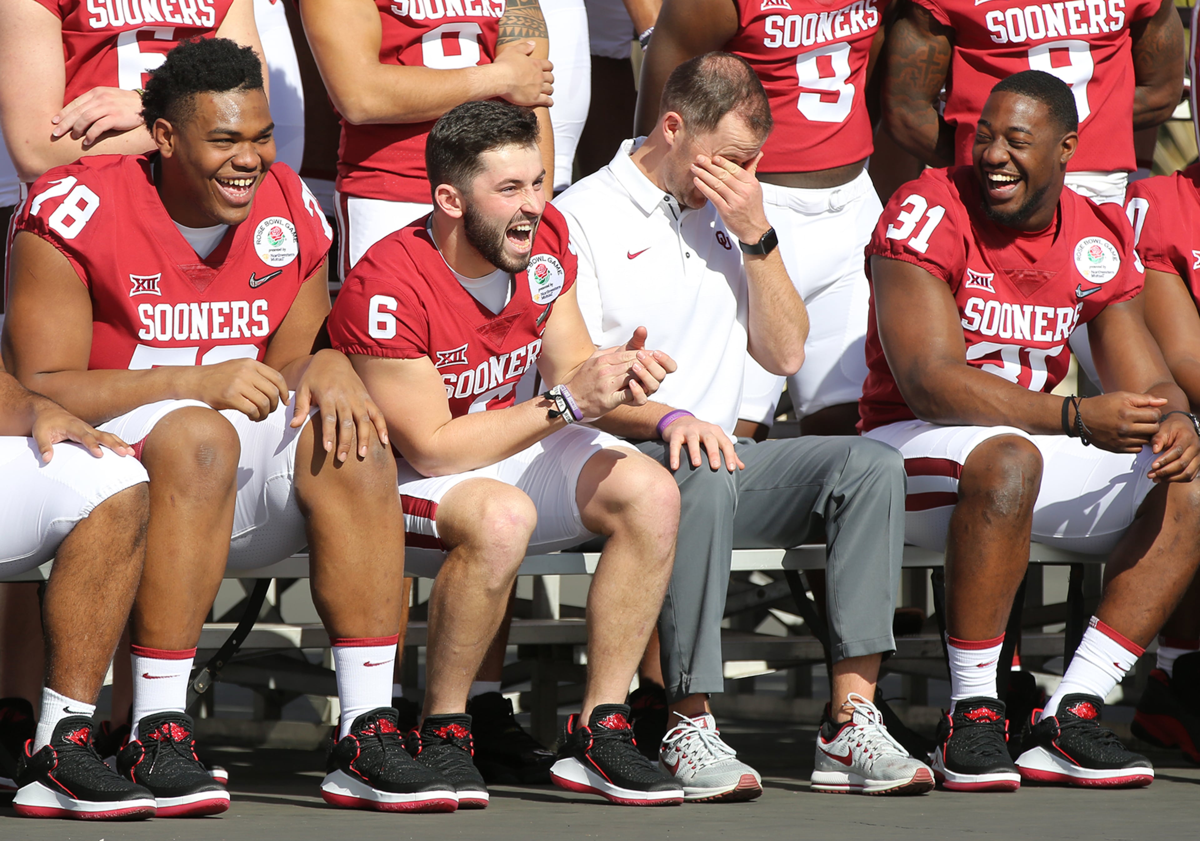 December 31, 2017 Pasadena: Oklahoma head coach Lincoln Riley reacts as offensive lineman Orlando Brown (from left), quarterback Baker Mayfield, and defensive end Ogbonnia Okoronkwo share a laugh during the official team photo at Rose Bowl Stadium on Sunday, December 31, 2017, in Pasadena. Curtis Compton/ccompton@ajc.com