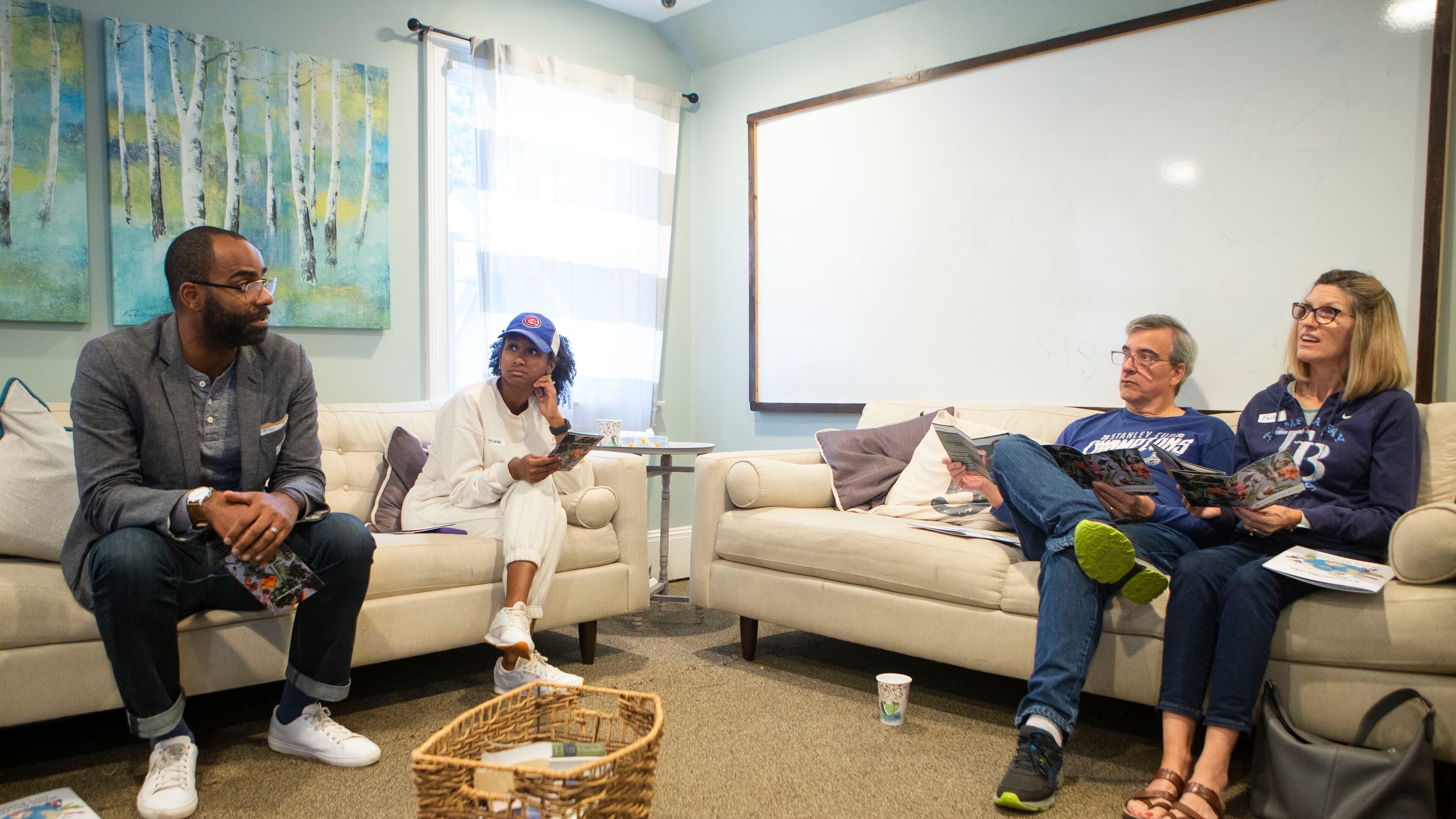 (Left to right) Marqus Cole, adult ministry and community outreach coordinator at Grace Snelville Church, leads discussion with Amanda Cole, Mark Stone and Faith Stone during a climate change workshop on Wednesday, September 28, 2022 at Grace Snellville Church in Snellville, Georgia. Attendees discussed biblcal text supporting the protection of the earth and environmental programs that they can join. CHRISTINA MATACOTTA FOR THE ATLANTA JOURNAL-CONSTITUTION.