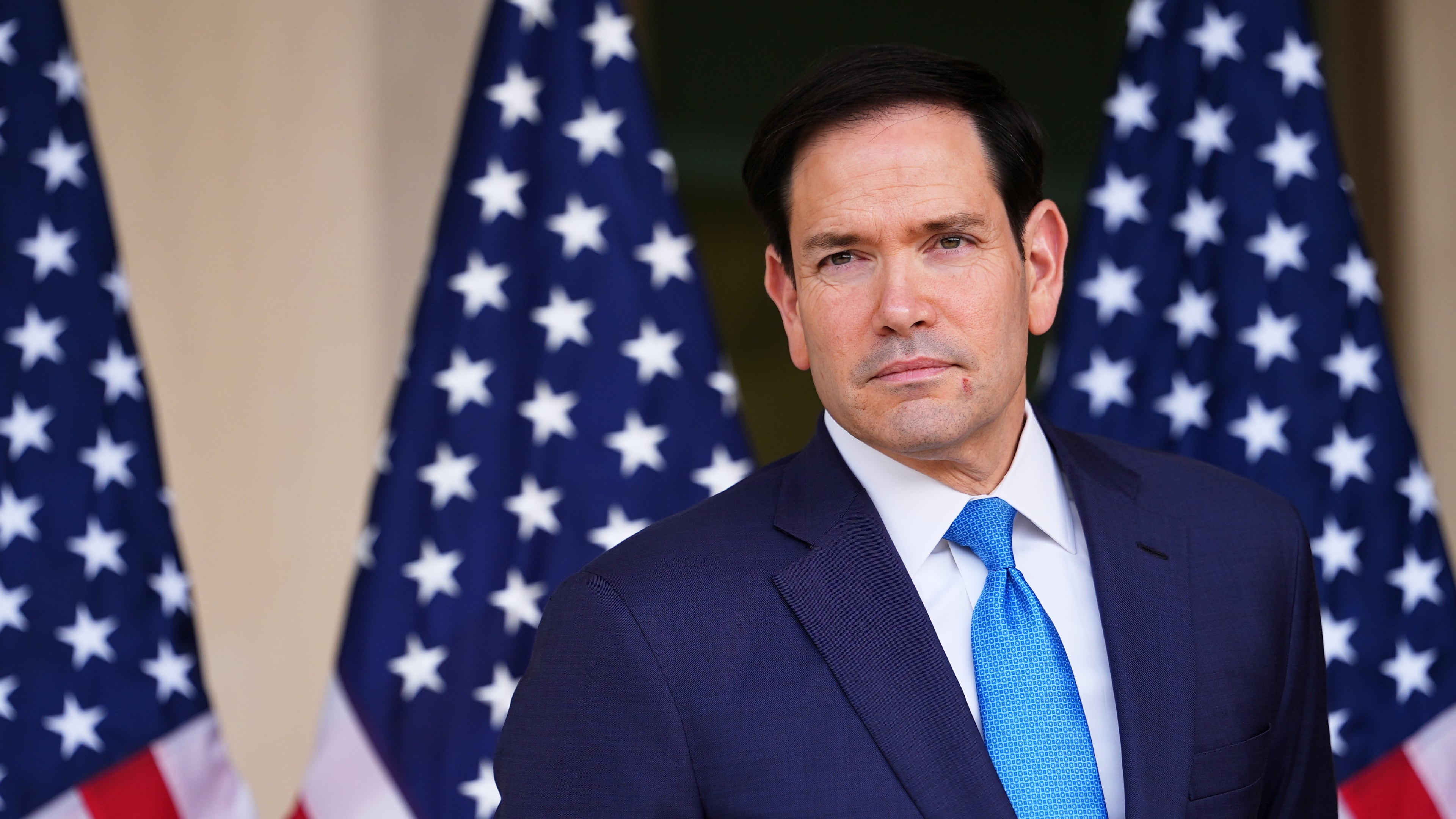 United States Secretary of State Marco Rubio, waits as US Ambassador to India Sergio Gor, unseen, speaks at a dedication ceremony for an annex building at the U.S. Embassy in New Delhi, India, Saturday, May 23, 2026. (AP Photo/Julia Demaree Nikhinson, Pool)